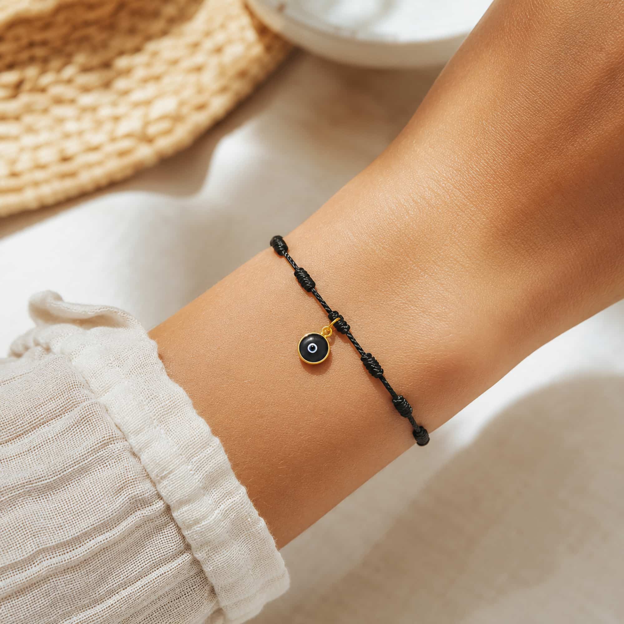 PULSERA 7 NUDOS COLOR NEGRO CON OJO TURCO