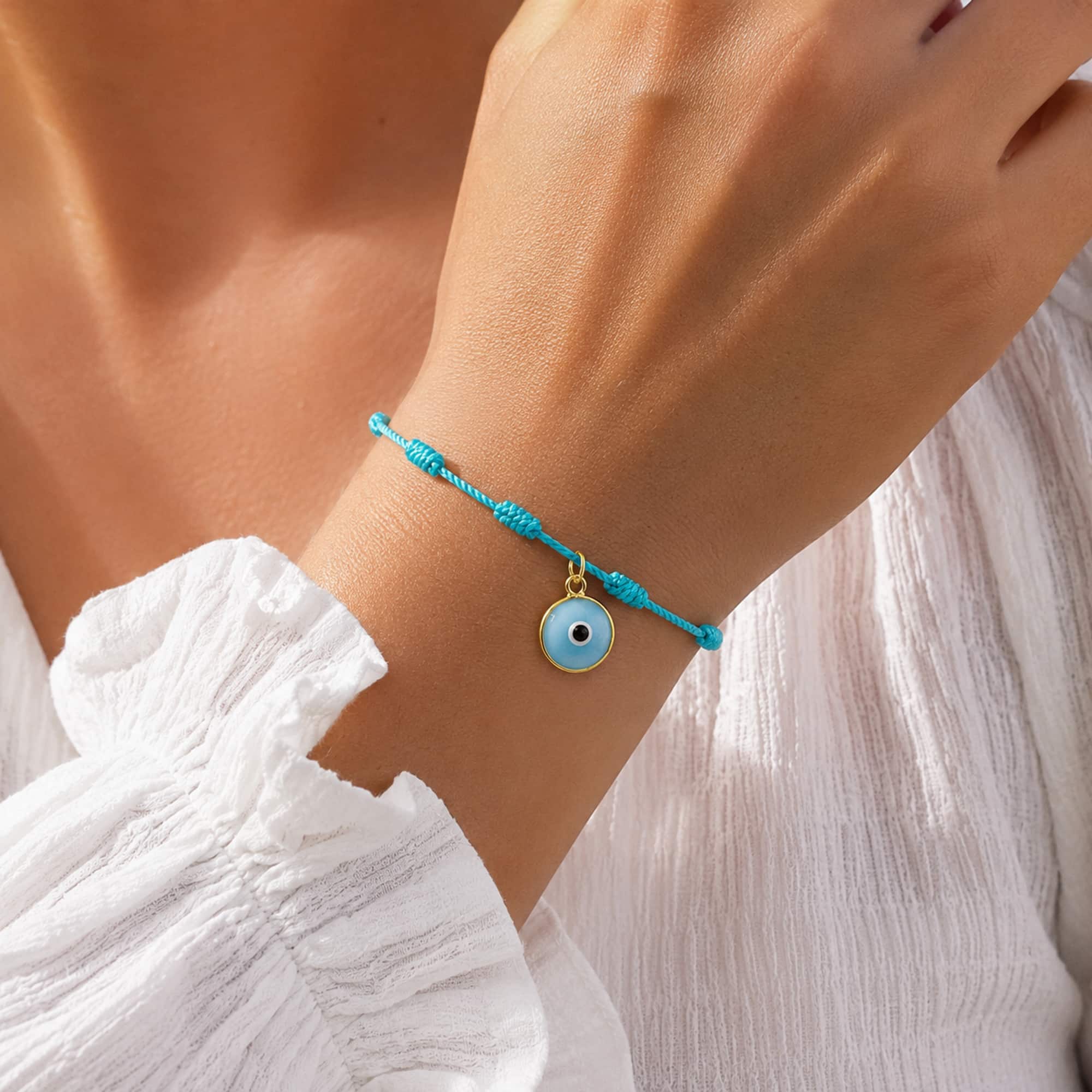 PULSERA 7 NUDOS AZUL CON COLGANTE DE OJO TURCO