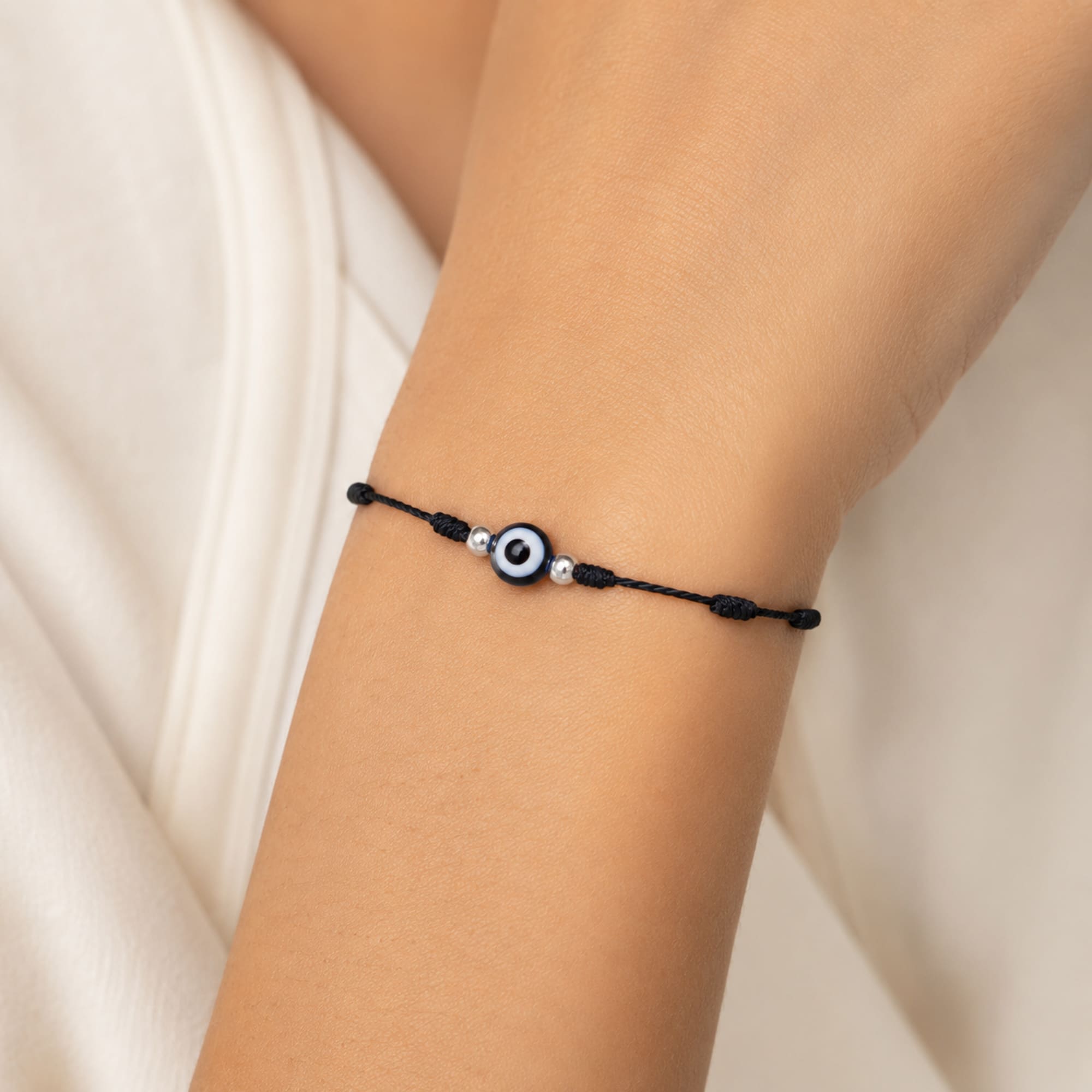 PULSERA 7 NUDOS COLOR NEGRO CON OJO TURCO