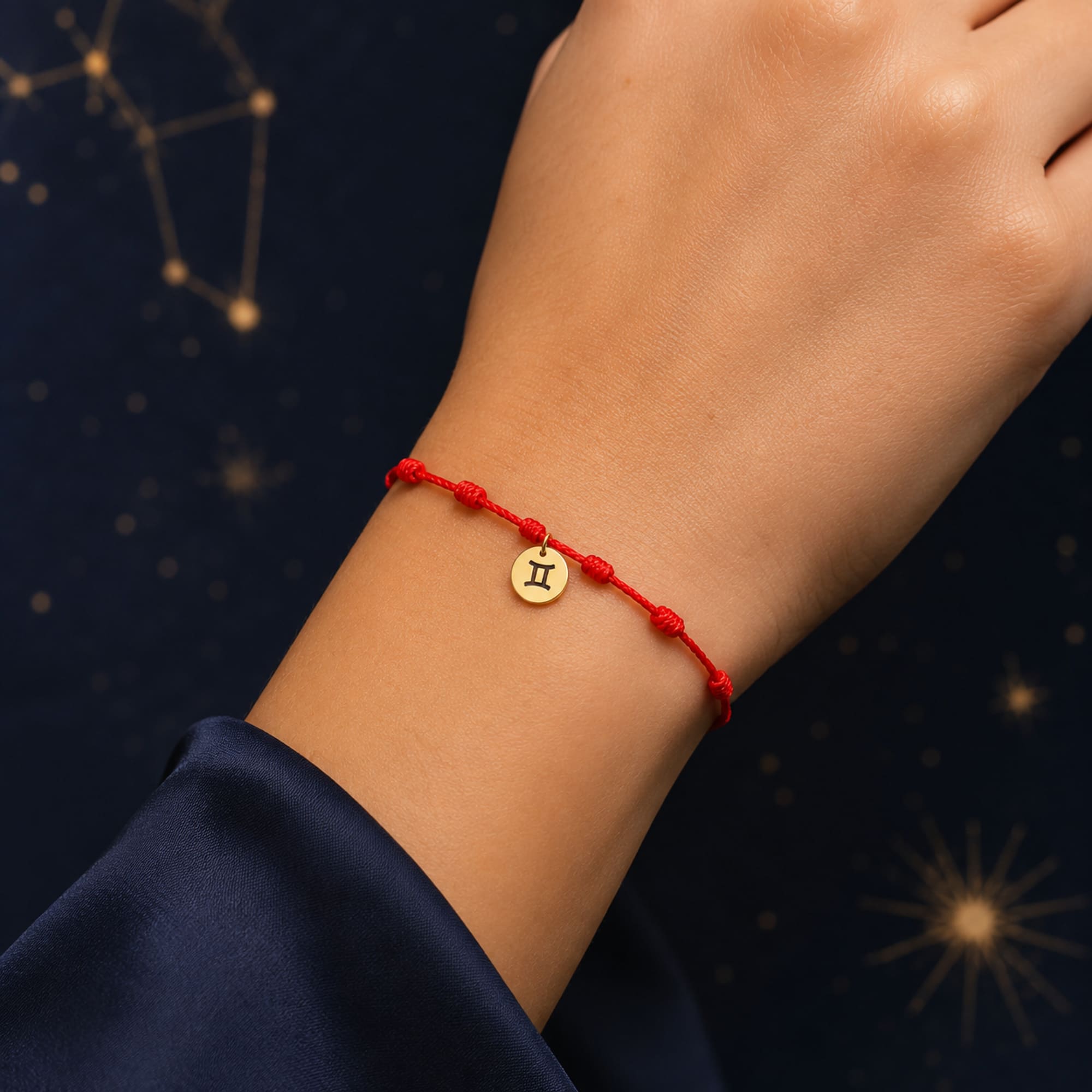 PULSERA 7 NUDOS CON GEMINIS ACERO. COLOR DORADO
