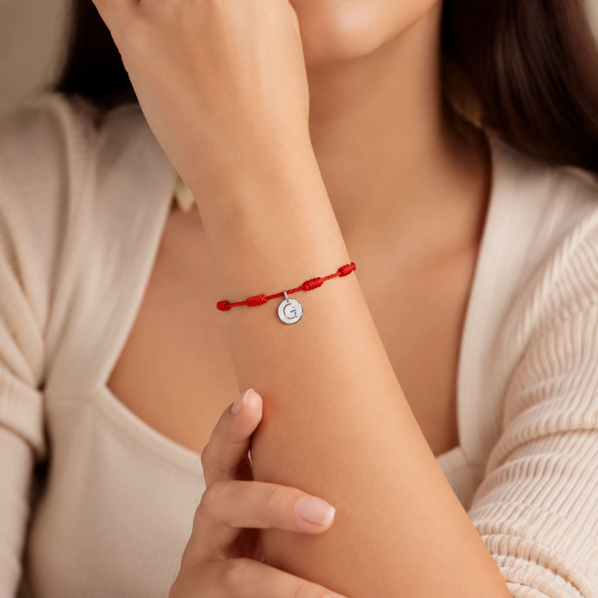 PULSERA 7 NUDOS CON LETRA G COLOR PLATEADO