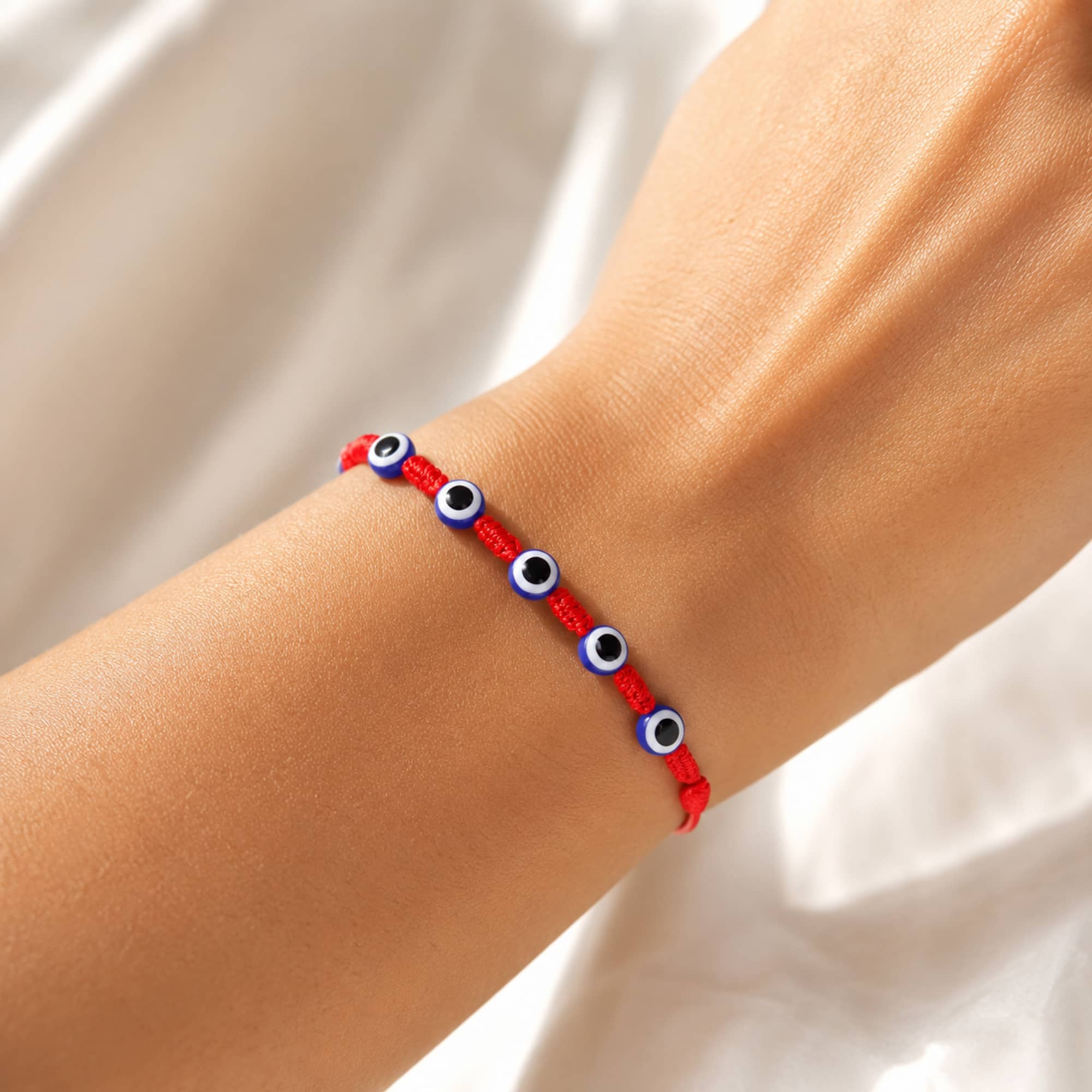 PULSERA 7 NUDOS CON 6 OJO DE TURCO