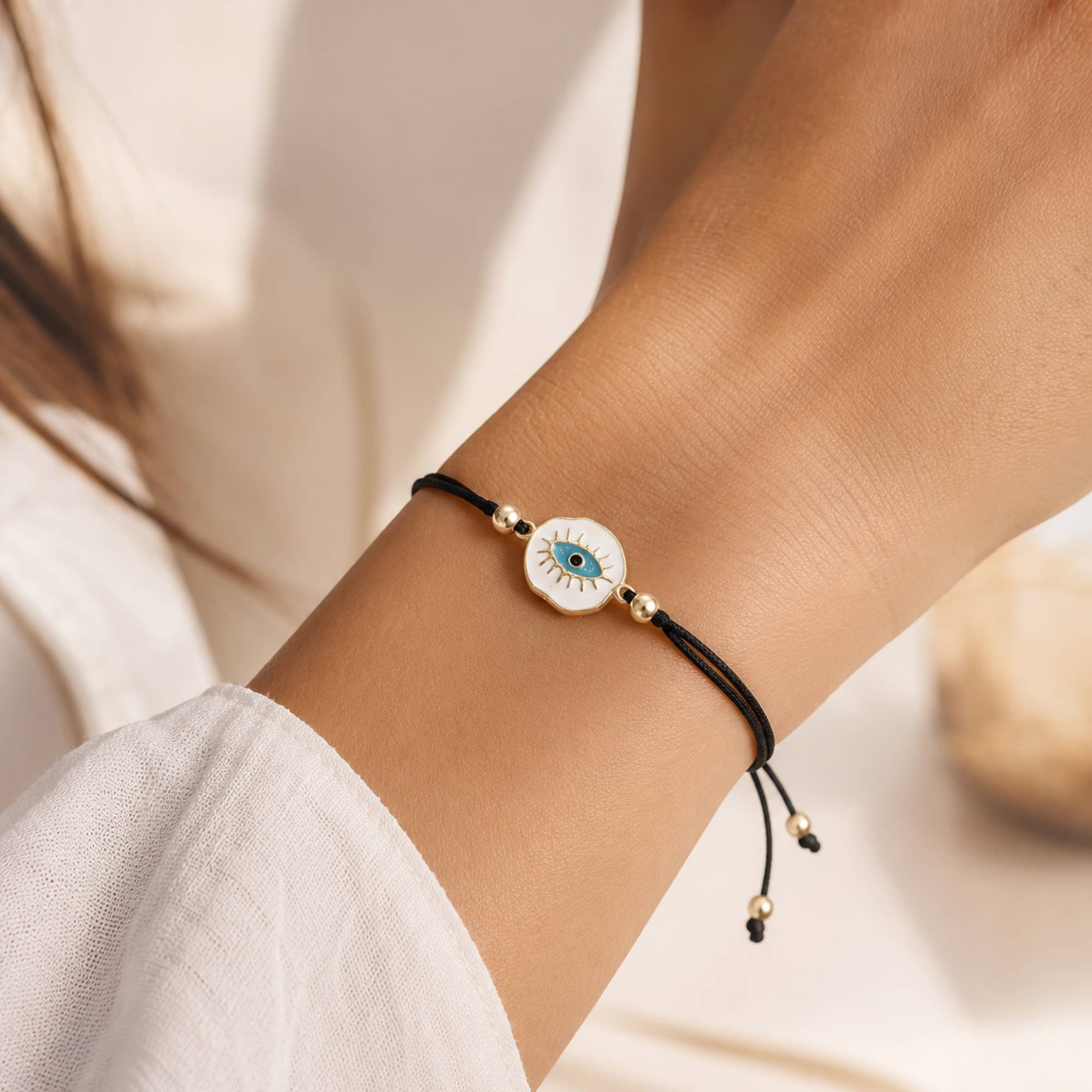 Pulsera Hilo encerado Negro CON OJO TURCO Dorado