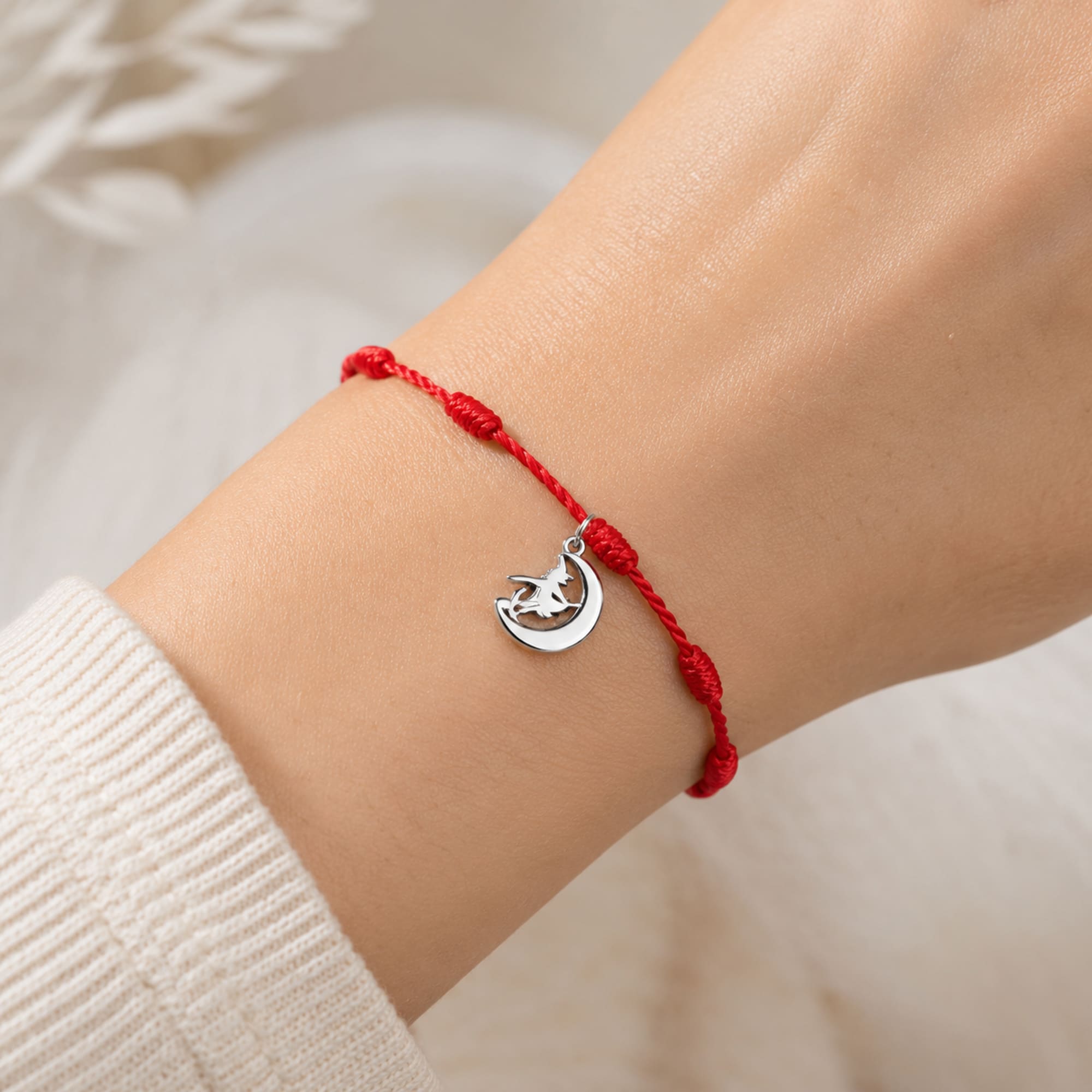 PULSERA 7 NUDOS CON BRUJA COLOR PLATEADO