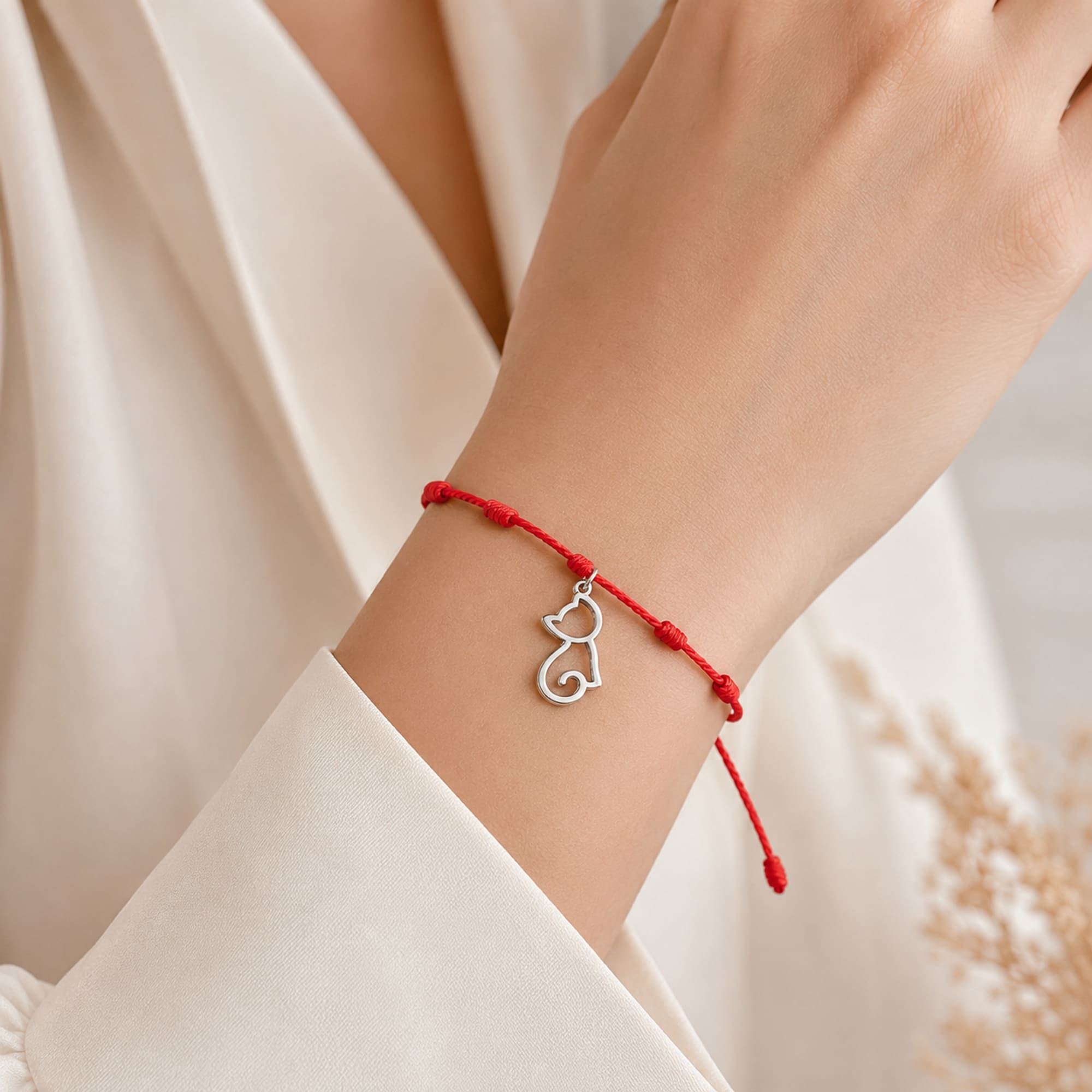 PULSERA 7 NUDOS CON GATO COLOR PLATEADO