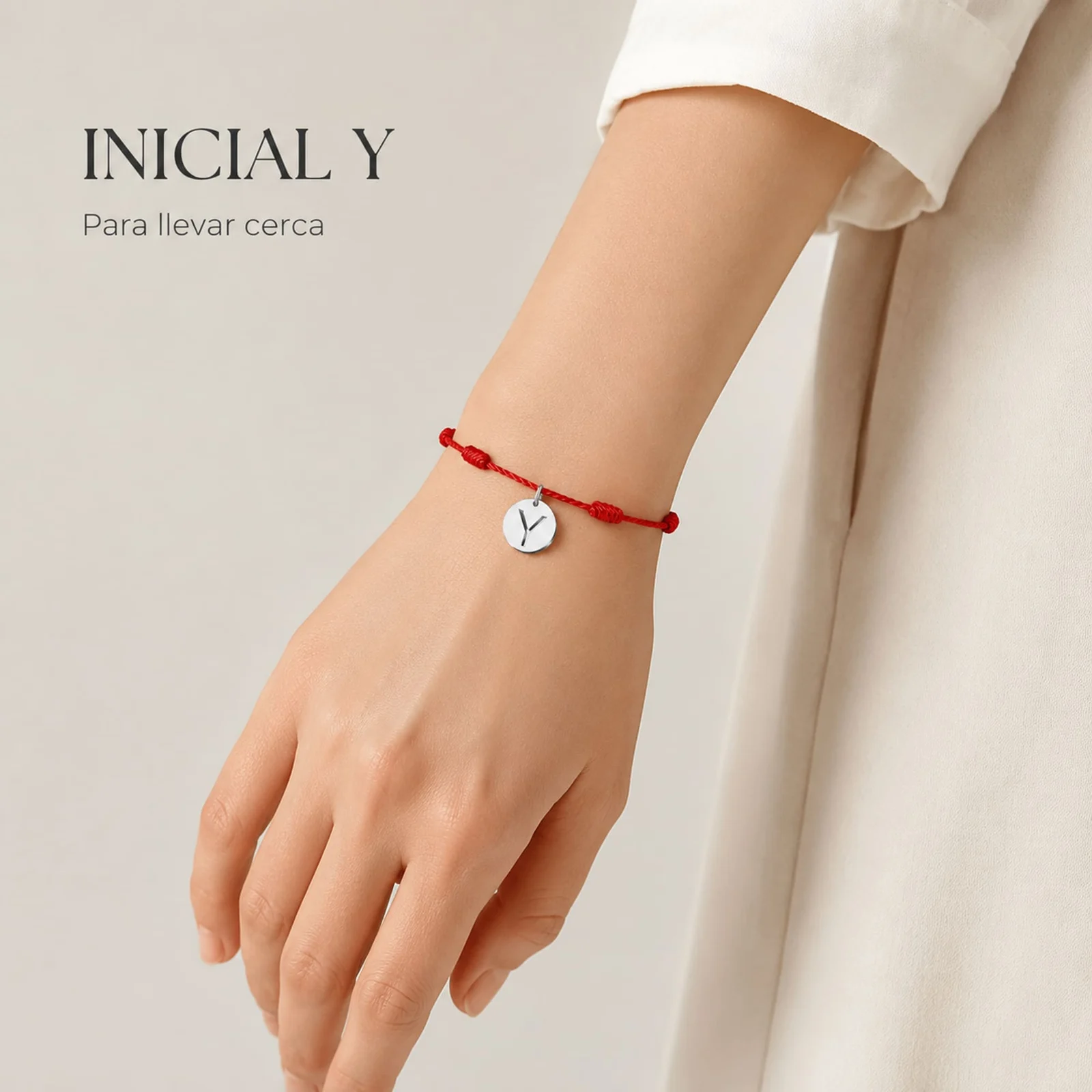 PULSERA 7 NUDOS CON LETRA Y COLOR PLATEADO