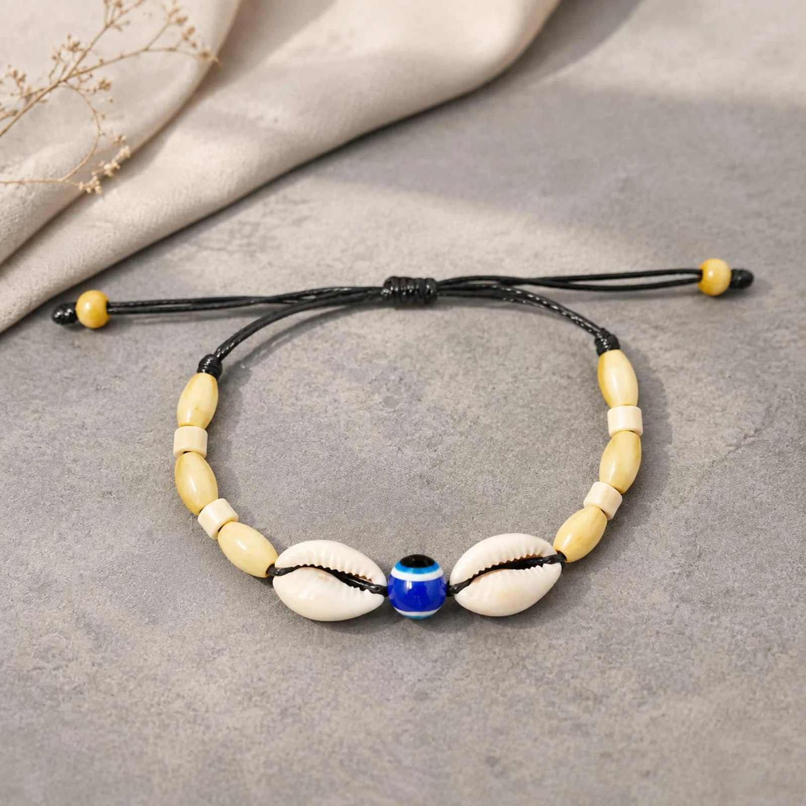 PULSERA HILO ENCERADO DE CONCHA