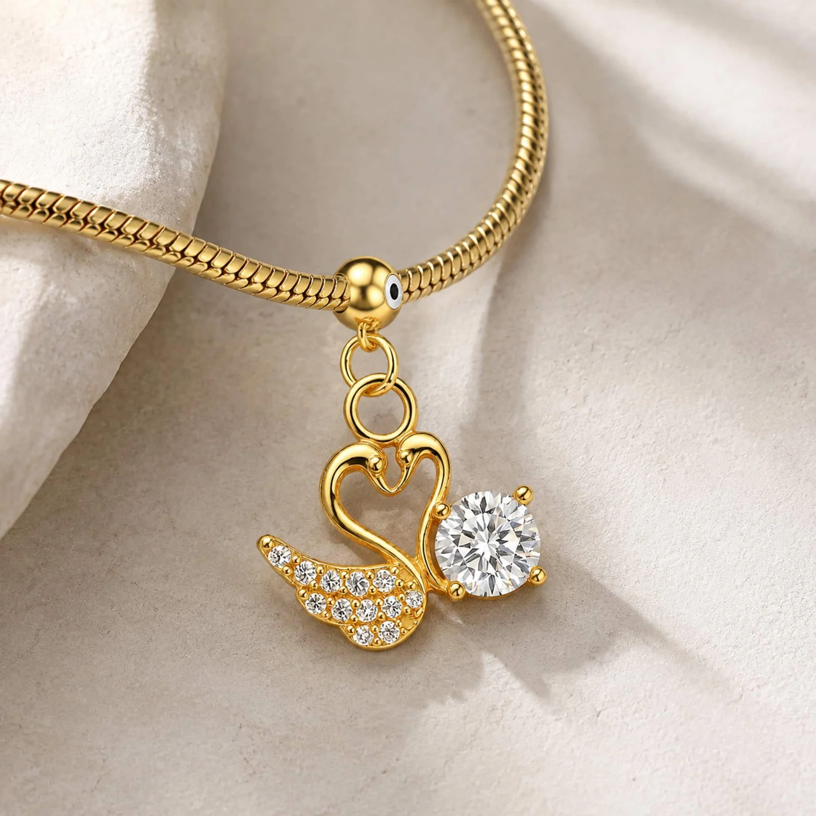 CHARM DE COBRE CHAPADO ORO 14K CON CIRCONITA-CON BOLA DE GOMA