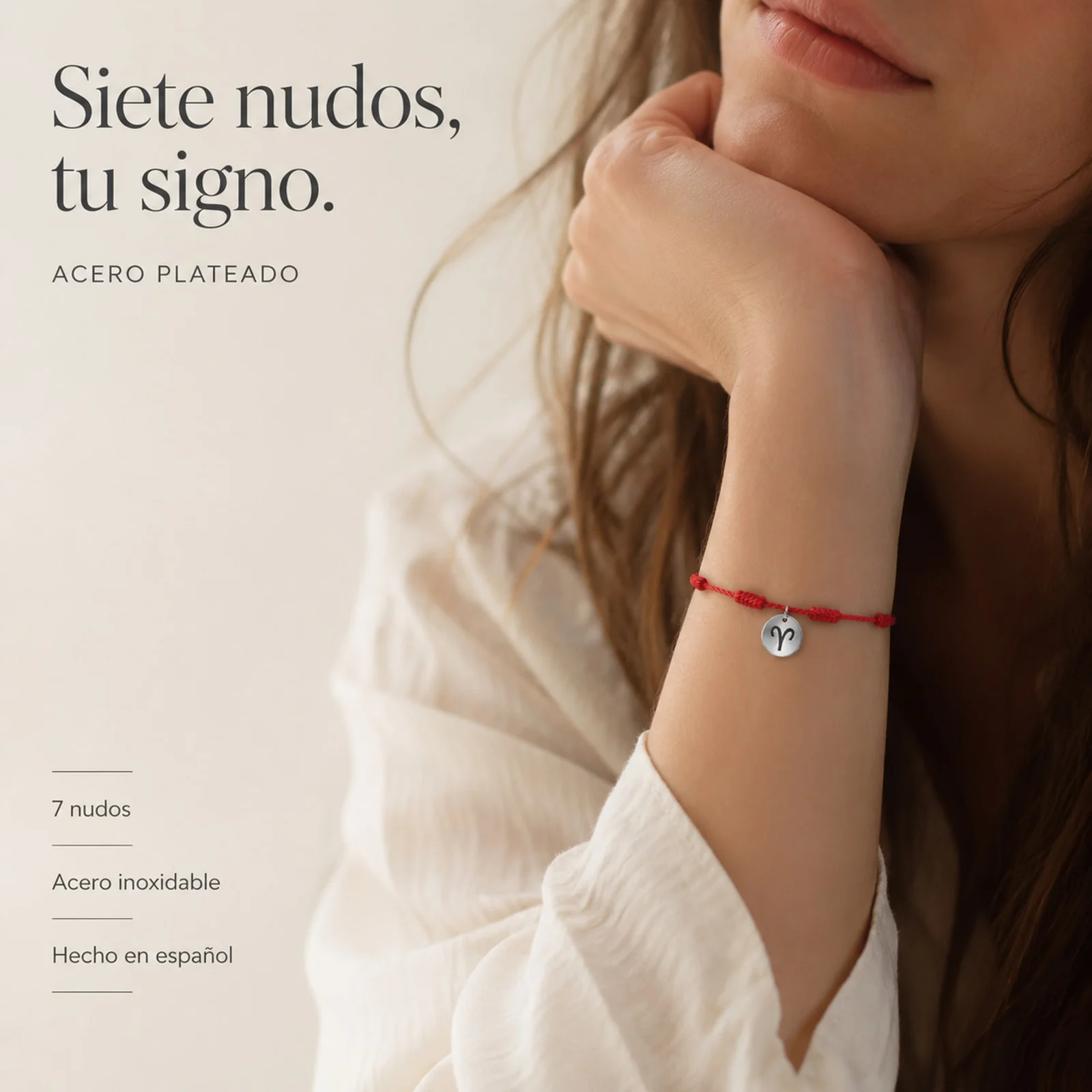 PULSERA 7 NUDOS CON ARIES ACERO. COLOR PLATEADO
