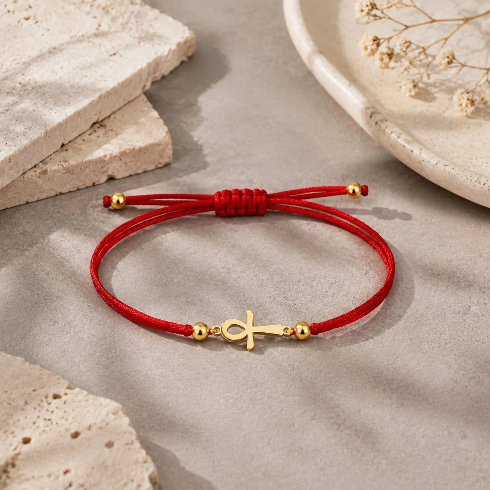 PULSERA CRUZ EGIPCIA DORADO DE HILO EN.ROJO