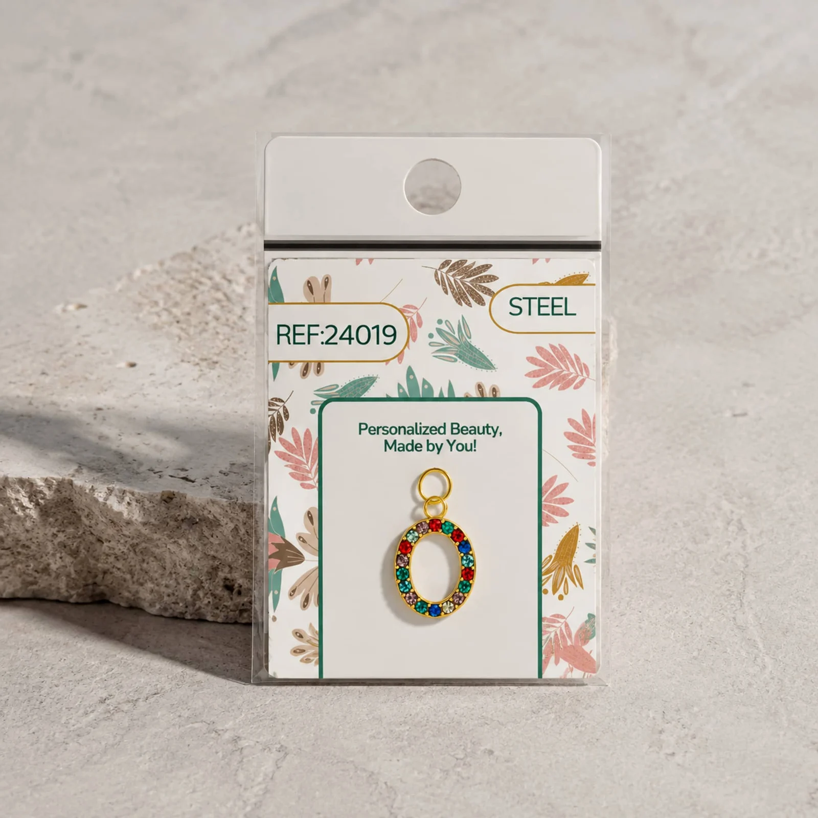 CHARM DE NÚMERO 0 ACERO COLOR DORADO CON CIRCONITA