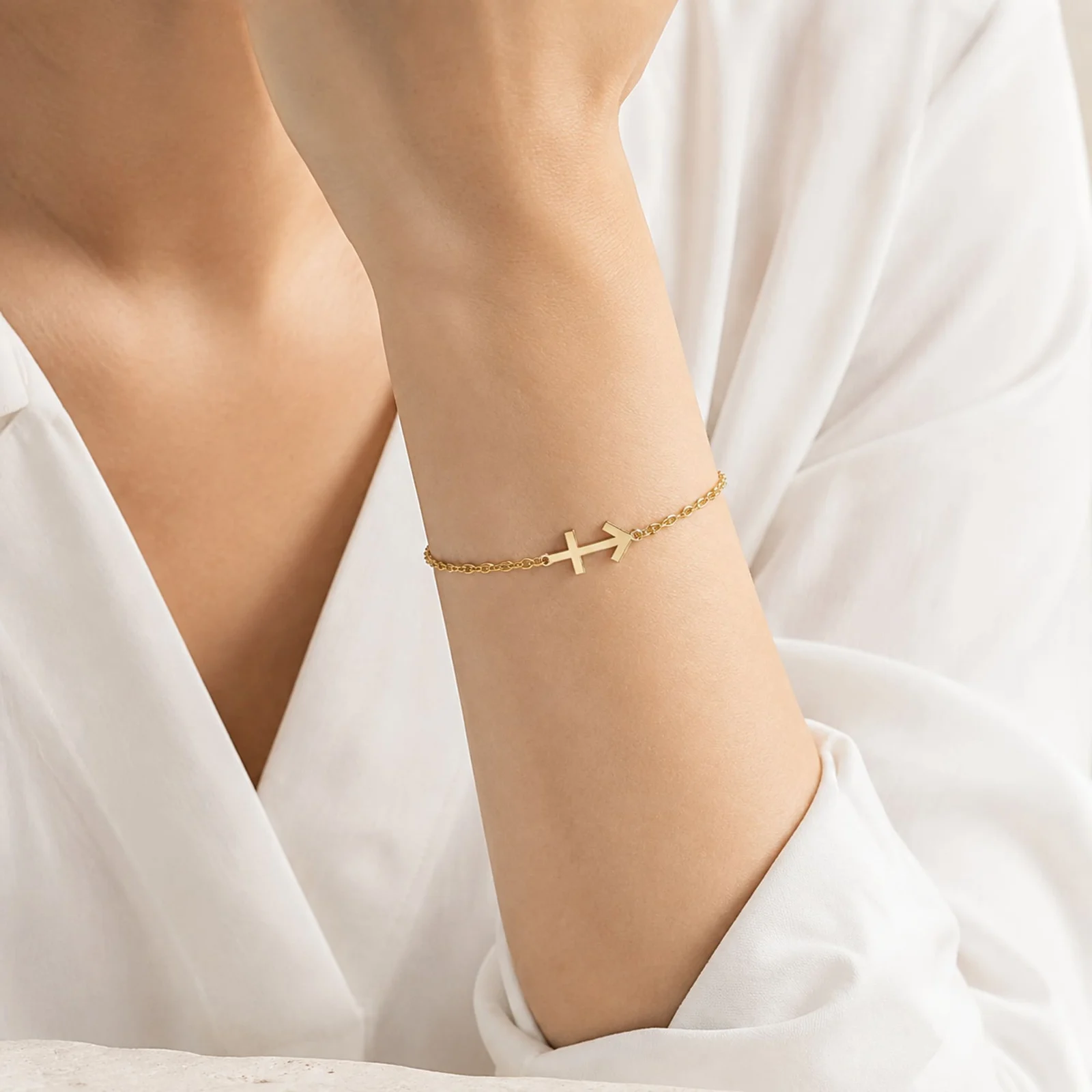 PULSERA CRUZ CONTRA EL MALACERO DORADO
