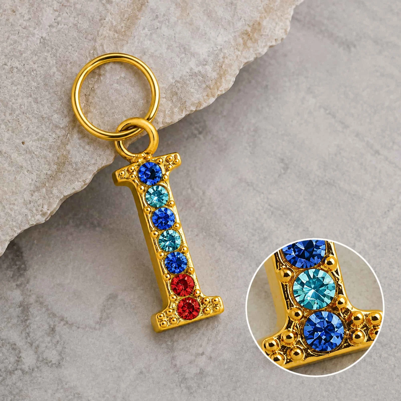 CHARM DE LETRA I ACERO COLOR DORADO CON CIRCONITA