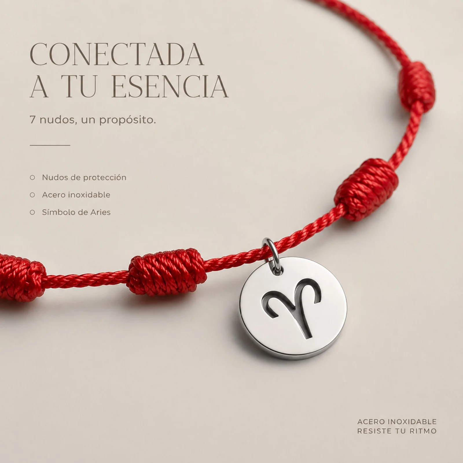 PULSERA 7 NUDOS CON ARIES ACERO. COLOR PLATEADO