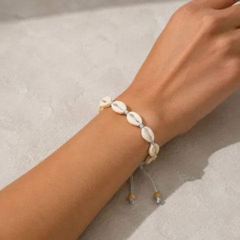 PULSERA HILO ENCERADO DE CONCHA