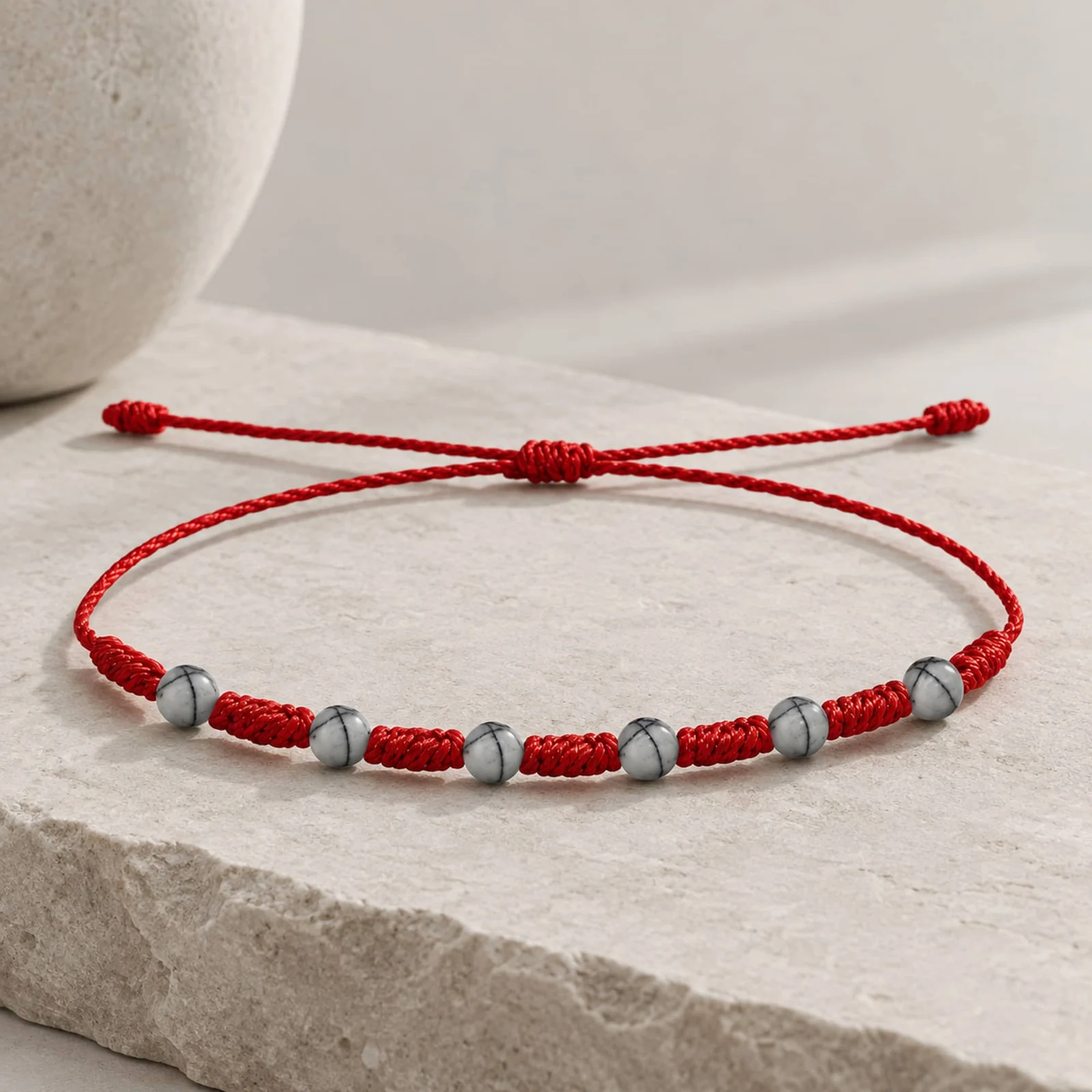 PULSERA 7 NUDOS CON  JASPE DE RED NEGRA 4MM