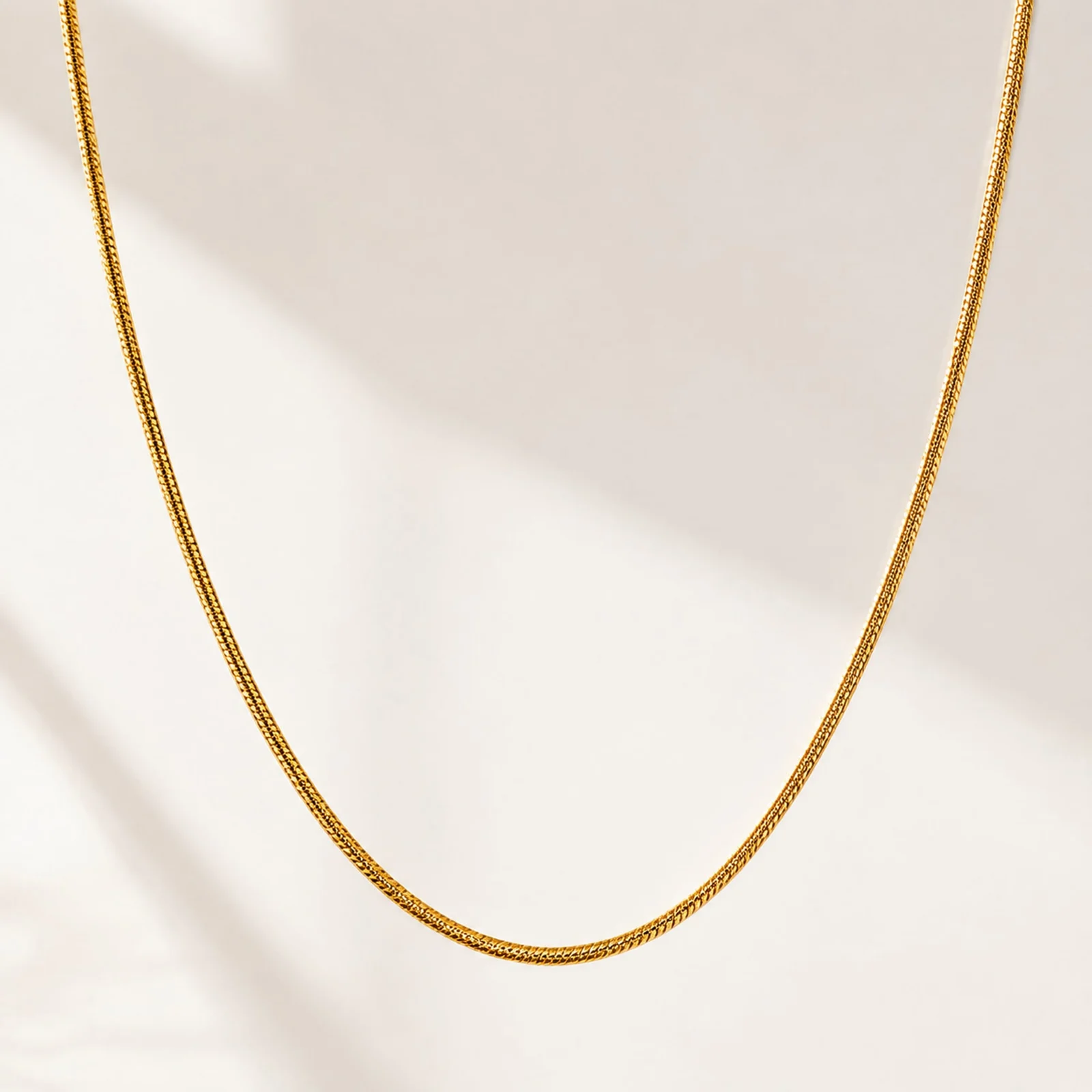 COLLAR DE CADENA ACERO DORADO