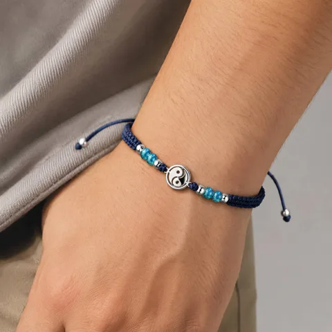 PULSERA HILO ENCERADO CON ÁGATA AZUL Y YINYAN ACERO