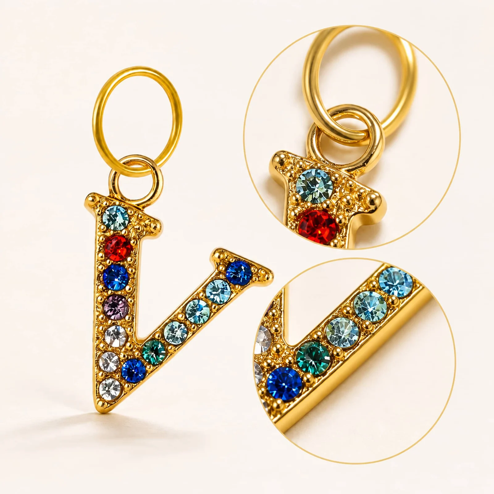 CHARM DE LETRA V ACERO COLOR DORADO CON CIRCONITA