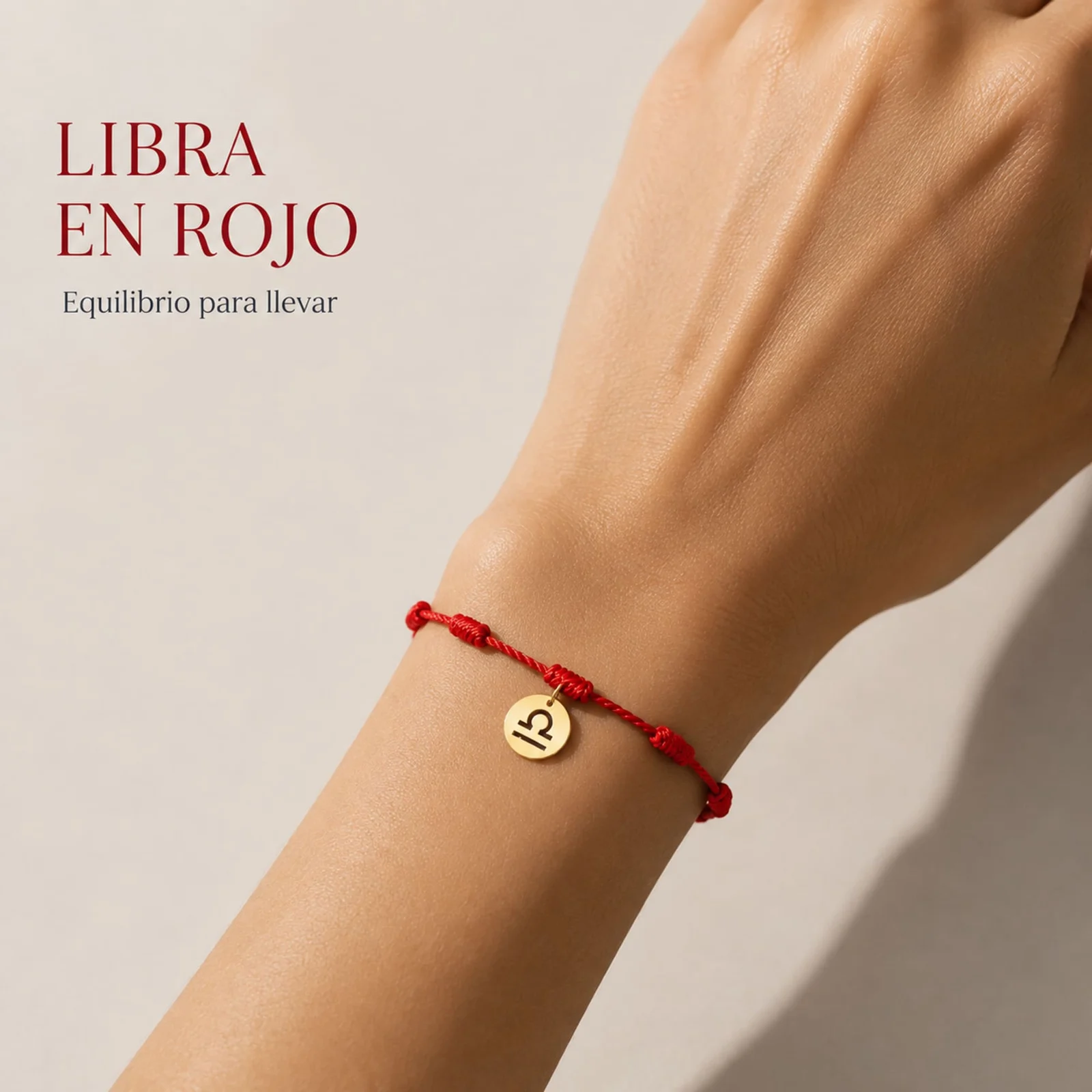 PULSERA 7 NUDOS CON LIBRA ACERO. COLOR DORADO