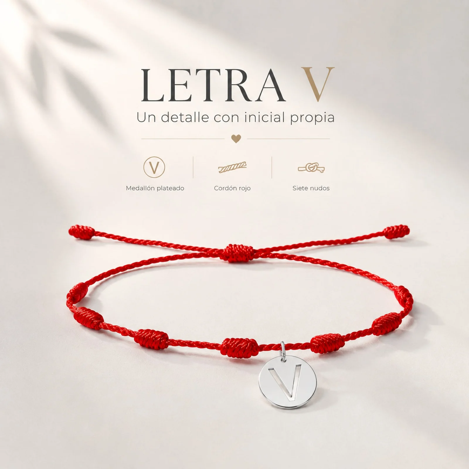 PULSERA 7 NUDOS CON LETRA V COLOR PLATEADO