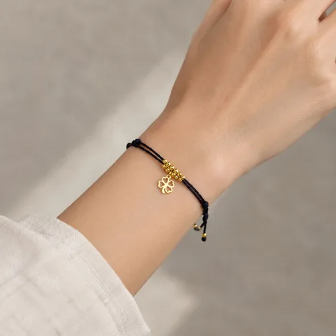 PULSERA HILO ENCERADO CON COLGANTE TRÉBOL ACERO DORADO