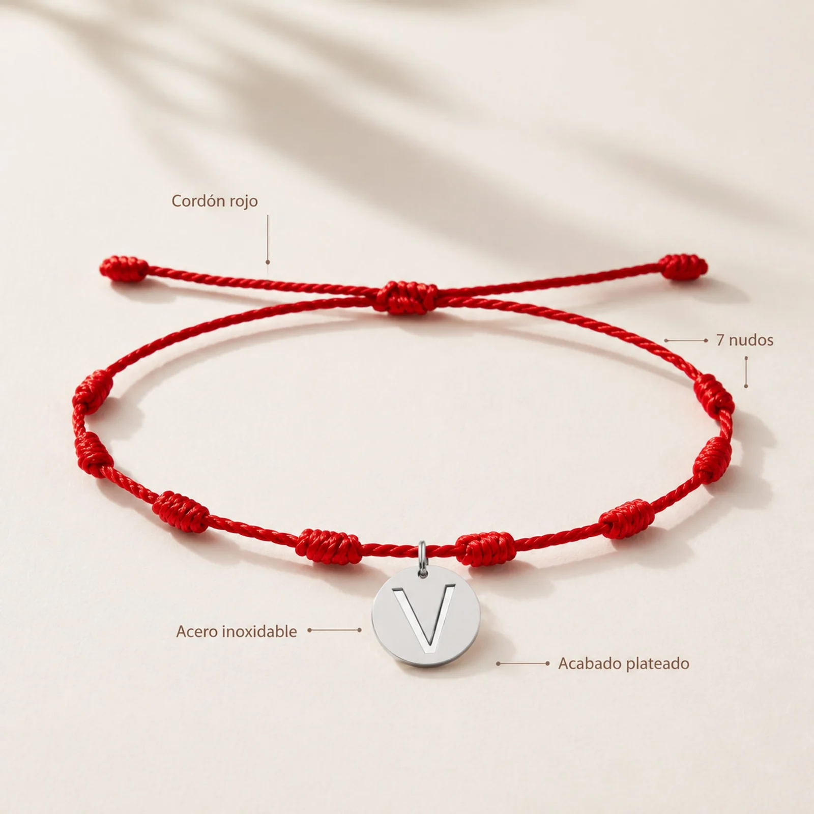 PULSERA 7 NUDOS CON LETRA V COLOR PLATEADO