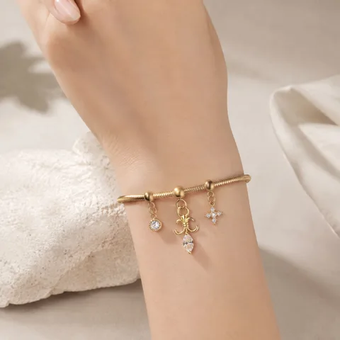 CHARM DE COBRE CHAPADO ORO 14K CON CIRCONITA-CON BOLA DE GOMA