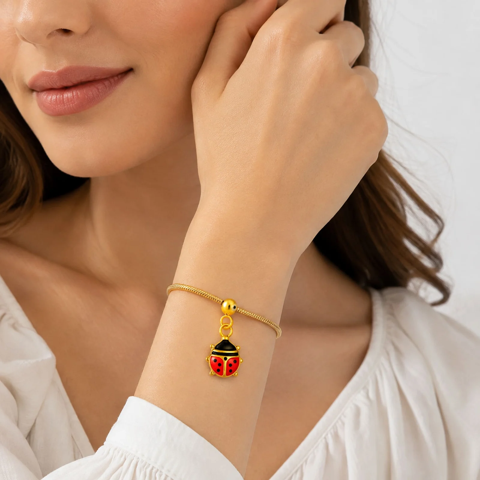 CHARM ACERO DORADO CHAPADO ORO 14 K-CON BOLA DE GOMA