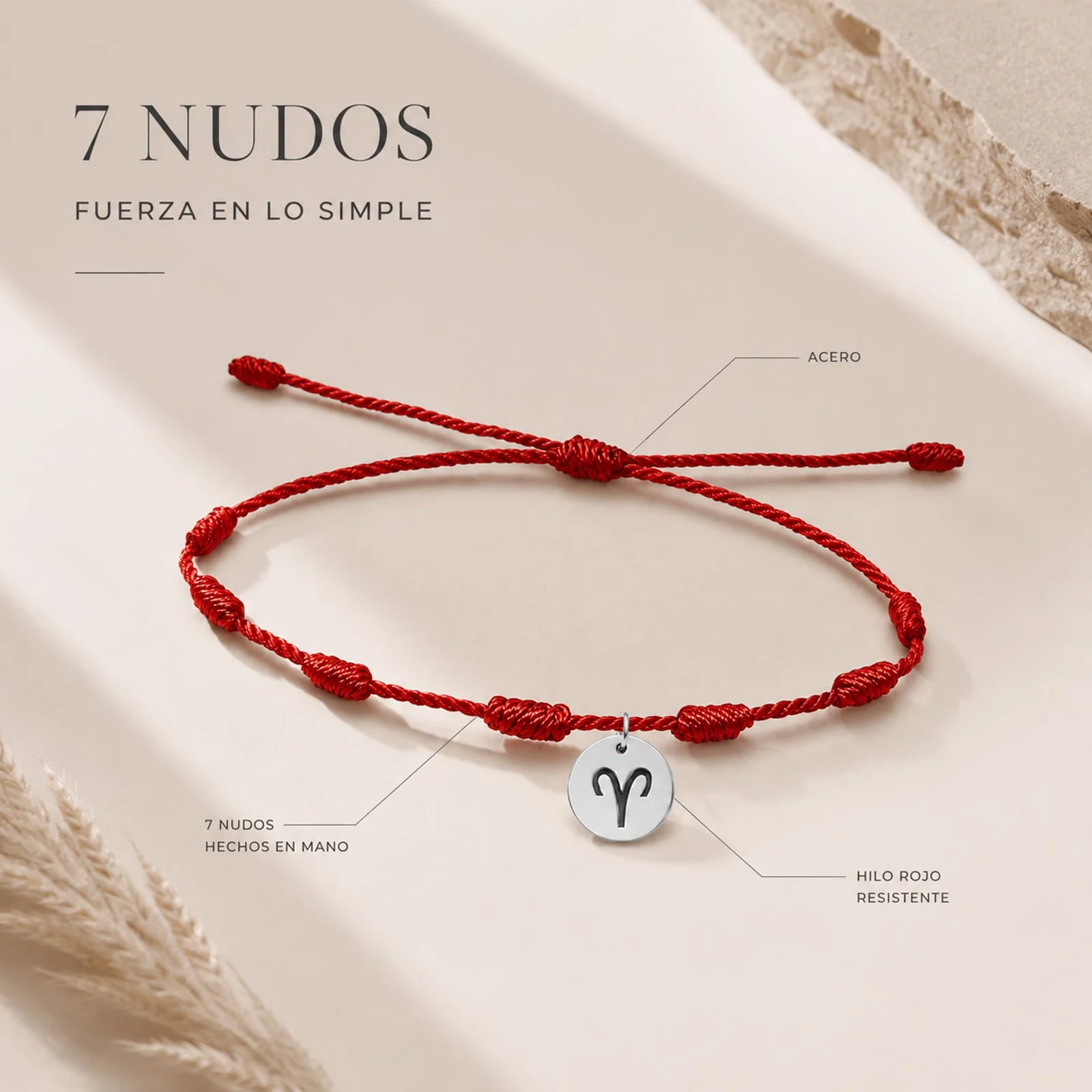 PULSERA 7 NUDOS CON ARIES ACERO. COLOR PLATEADO