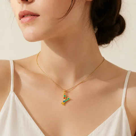 CHARM DE LETRA Y ACERO COLOR DORADO CON CIRCONITA-CON BOLA DE GOMA