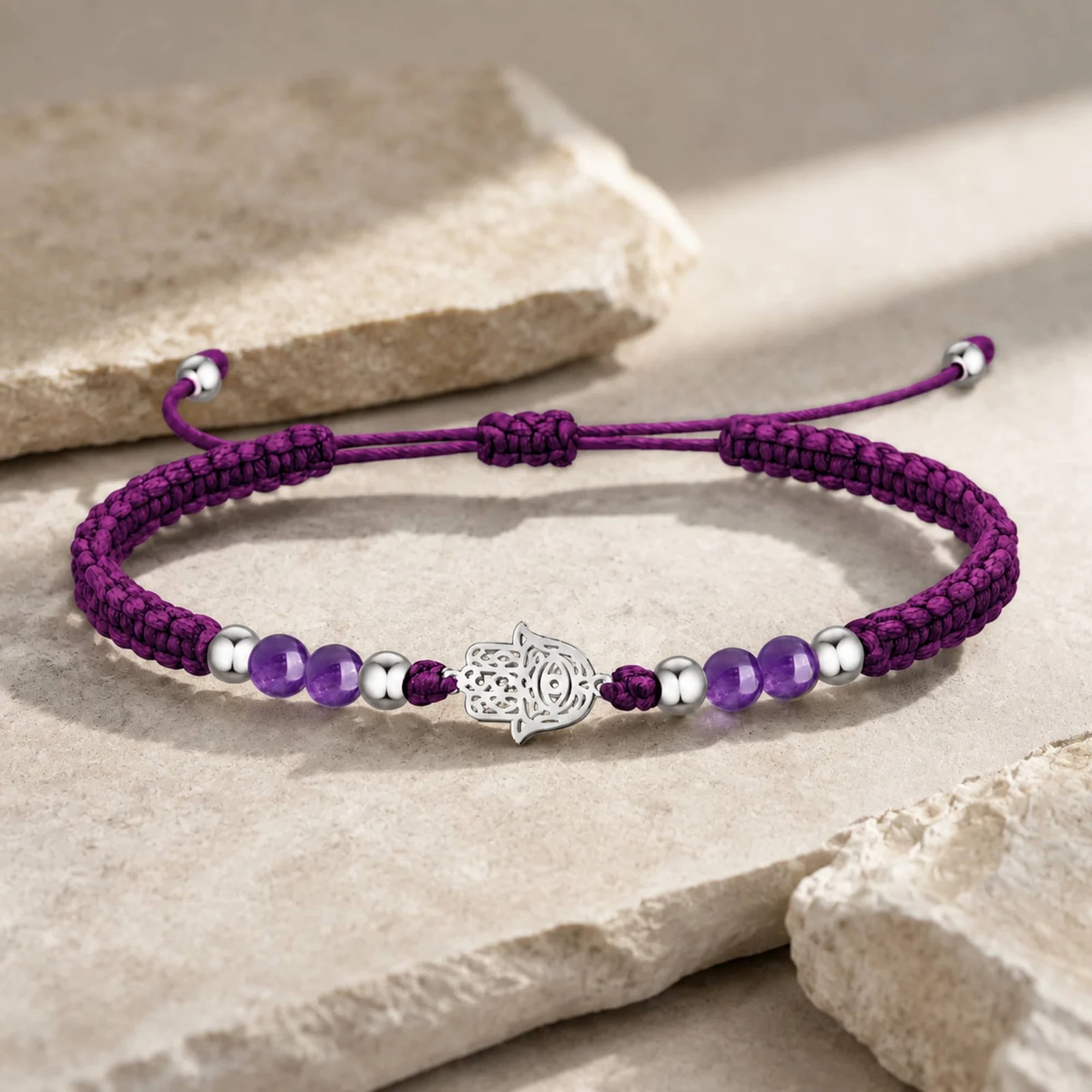 PULSERA HILO ENCERADO CON AMATISTA Y MANO DE FÁTIMA ACERO