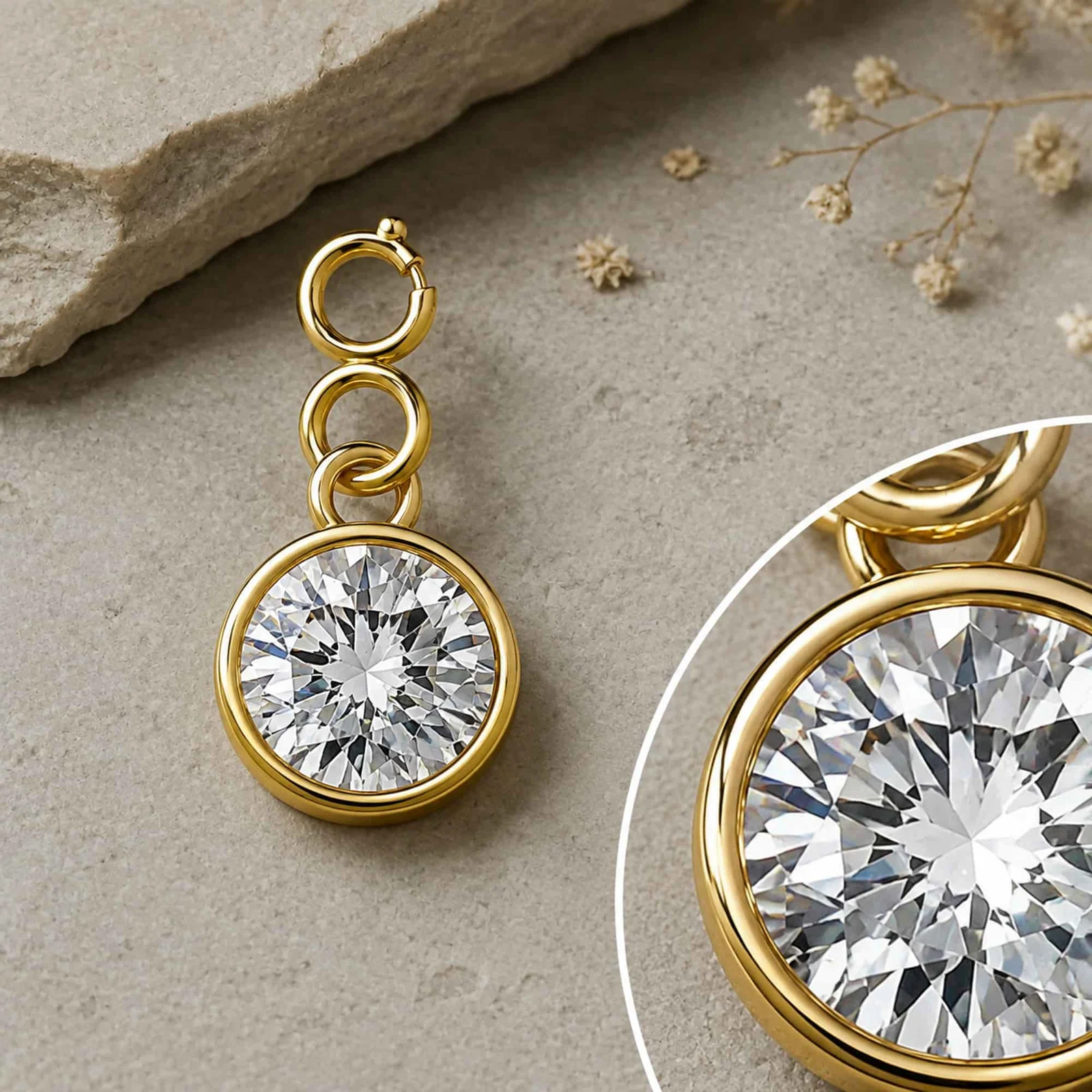CHARM ACERO DORADO CON PIEDRA NACIMIENTO DE ABRIL-CON CIERRE
