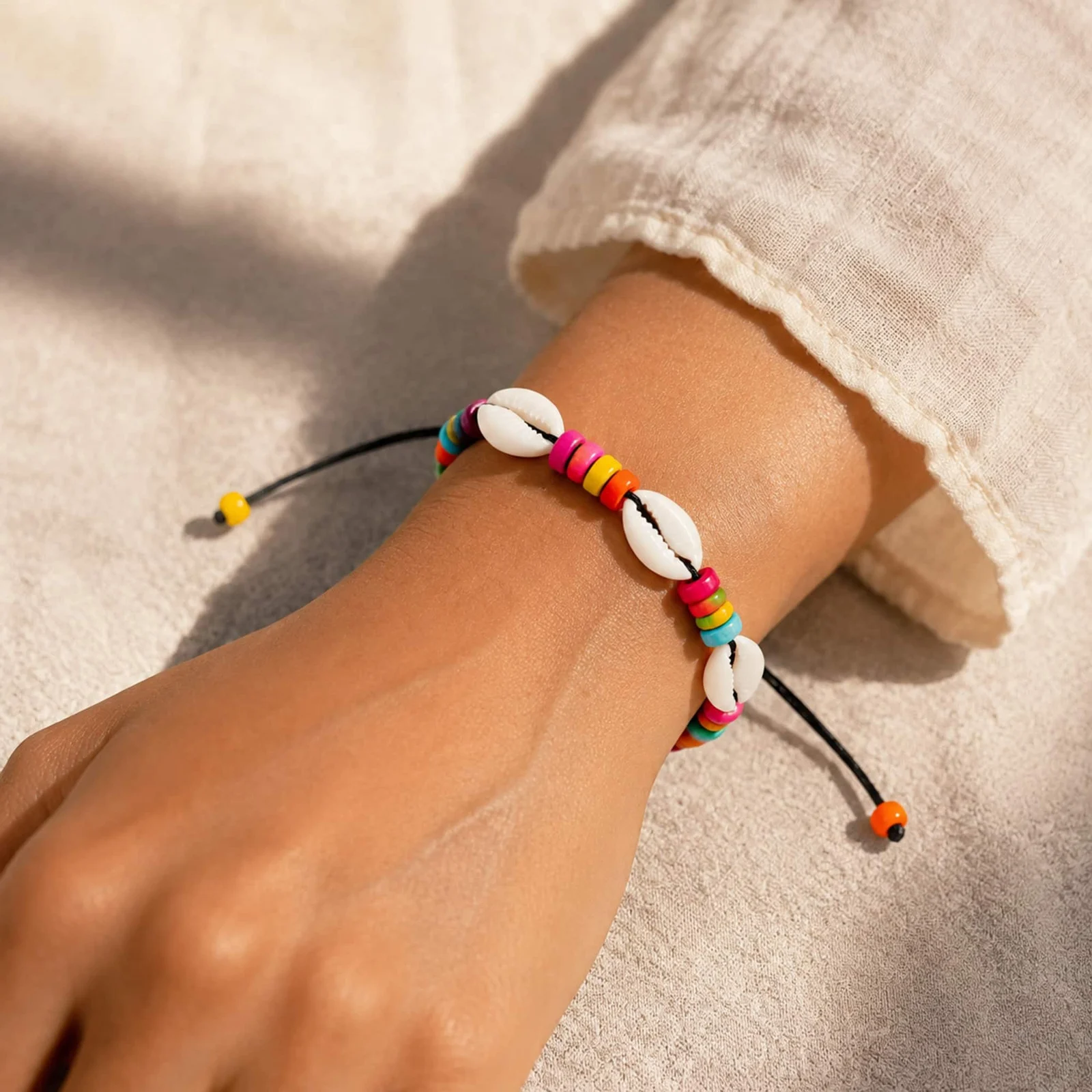 PULSERA HILO ENCERADO DE CONCHA