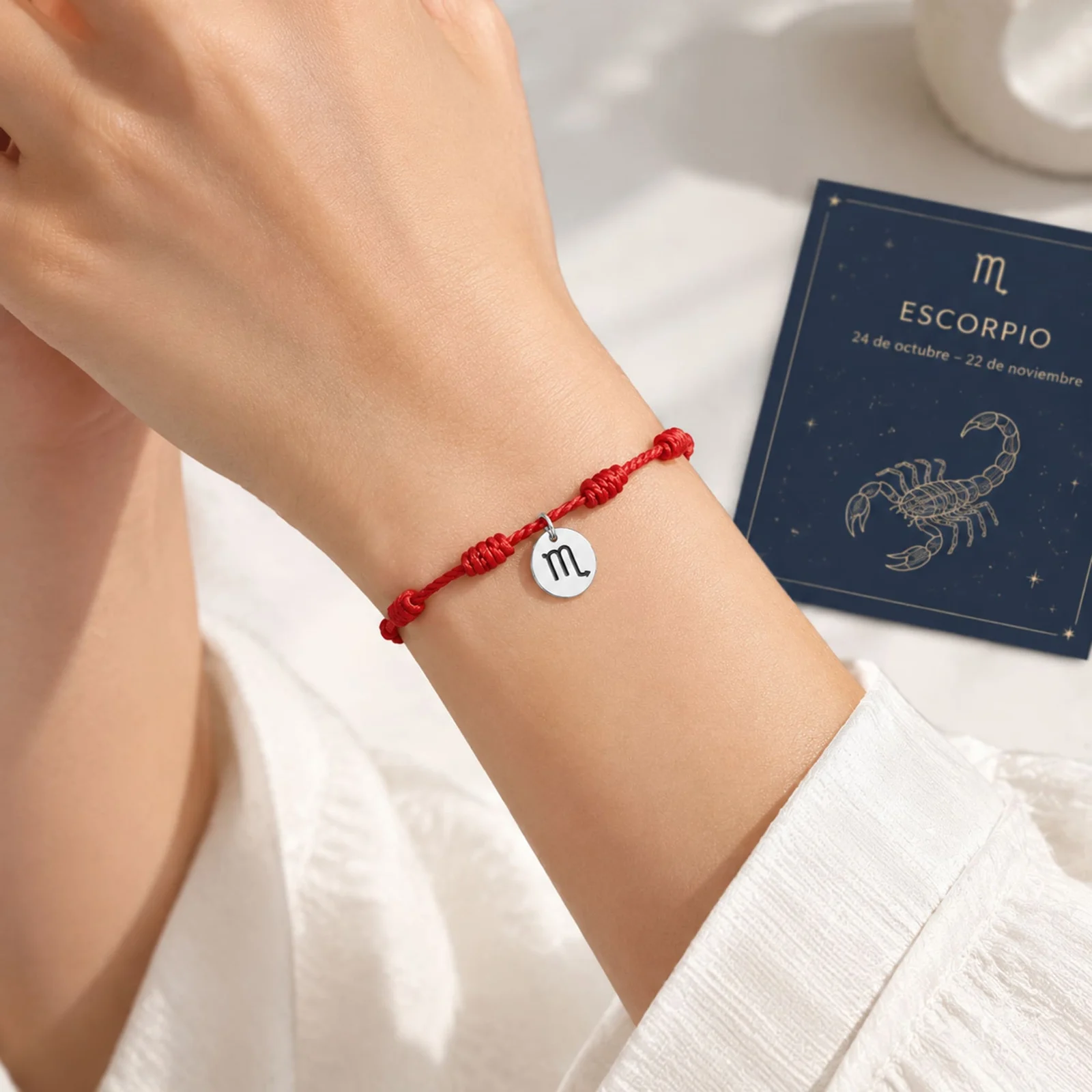 PULSERA 7 NUDOS CON ESCORPIO ACERO. COLOR PLATEADO