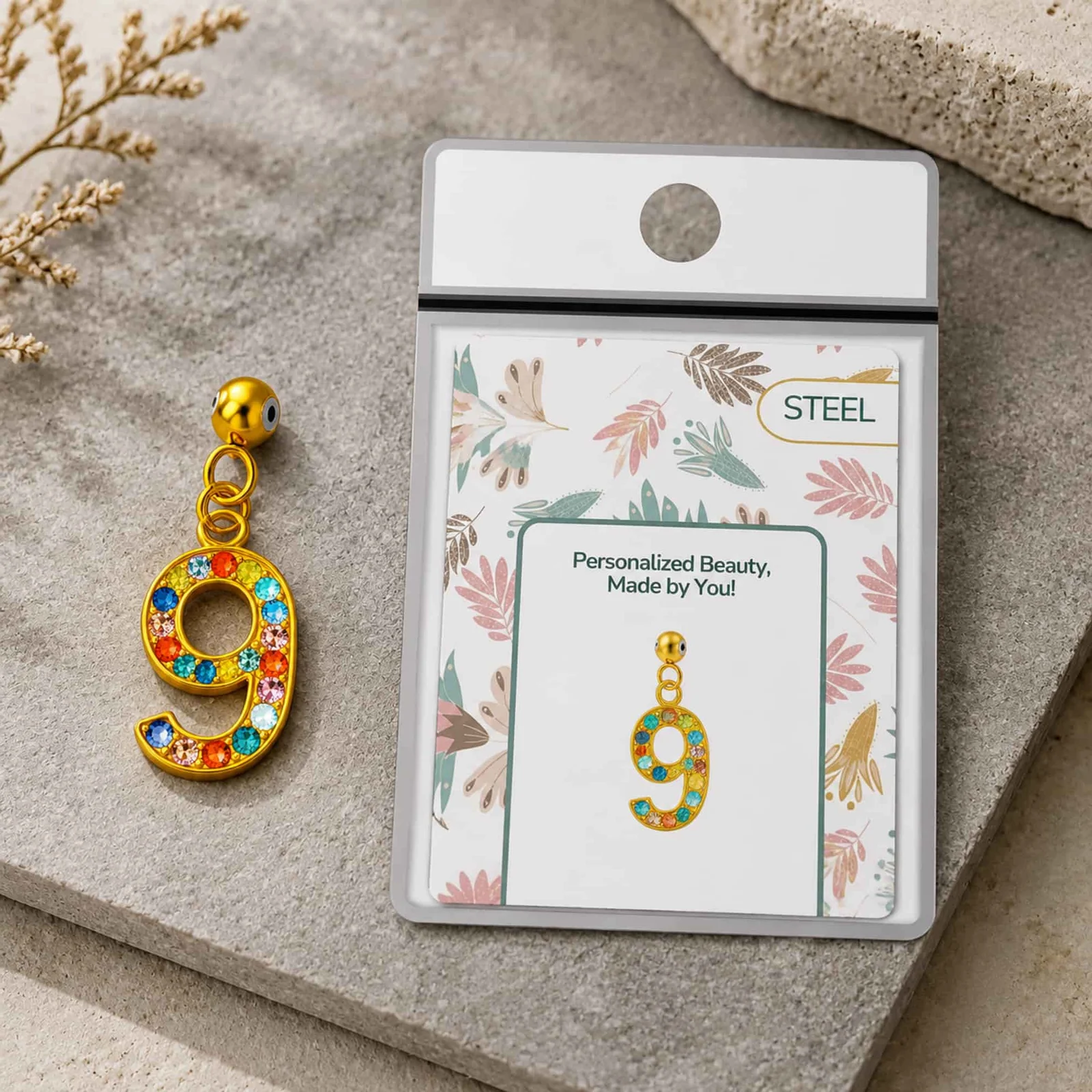 CHARM DE NÚMERO 9 ACERO COLOR DORADO CON CIRCONITA-CON BOLA DE GOMA