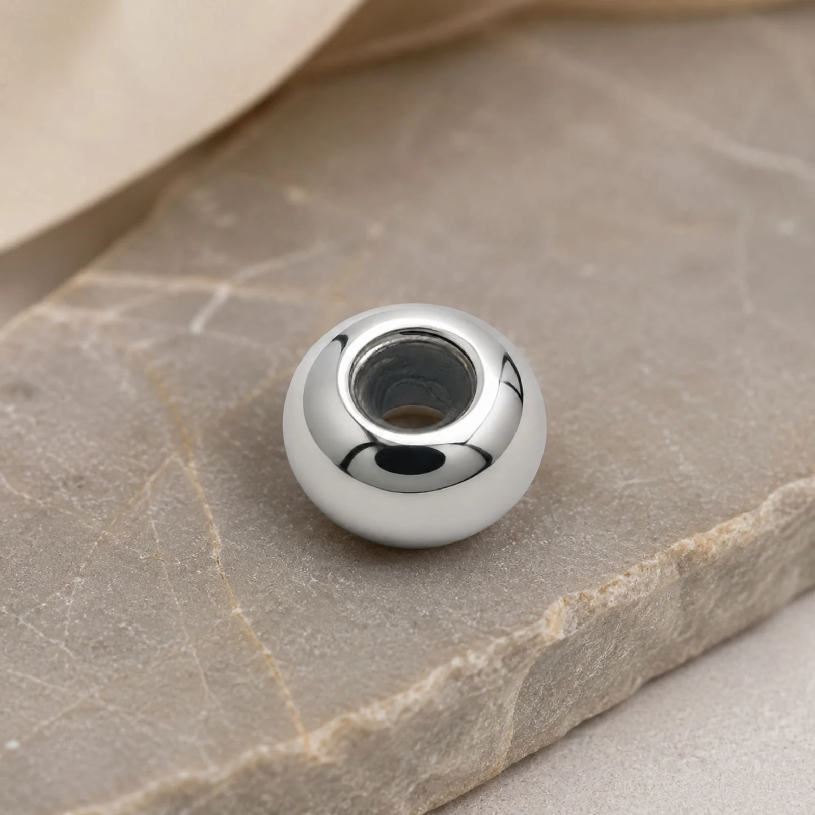 BOLA PLANO 6MM ACERO PLATEADO CON GOMA PARA FIJAR CHARM EN CADENA DE SERPIENTE