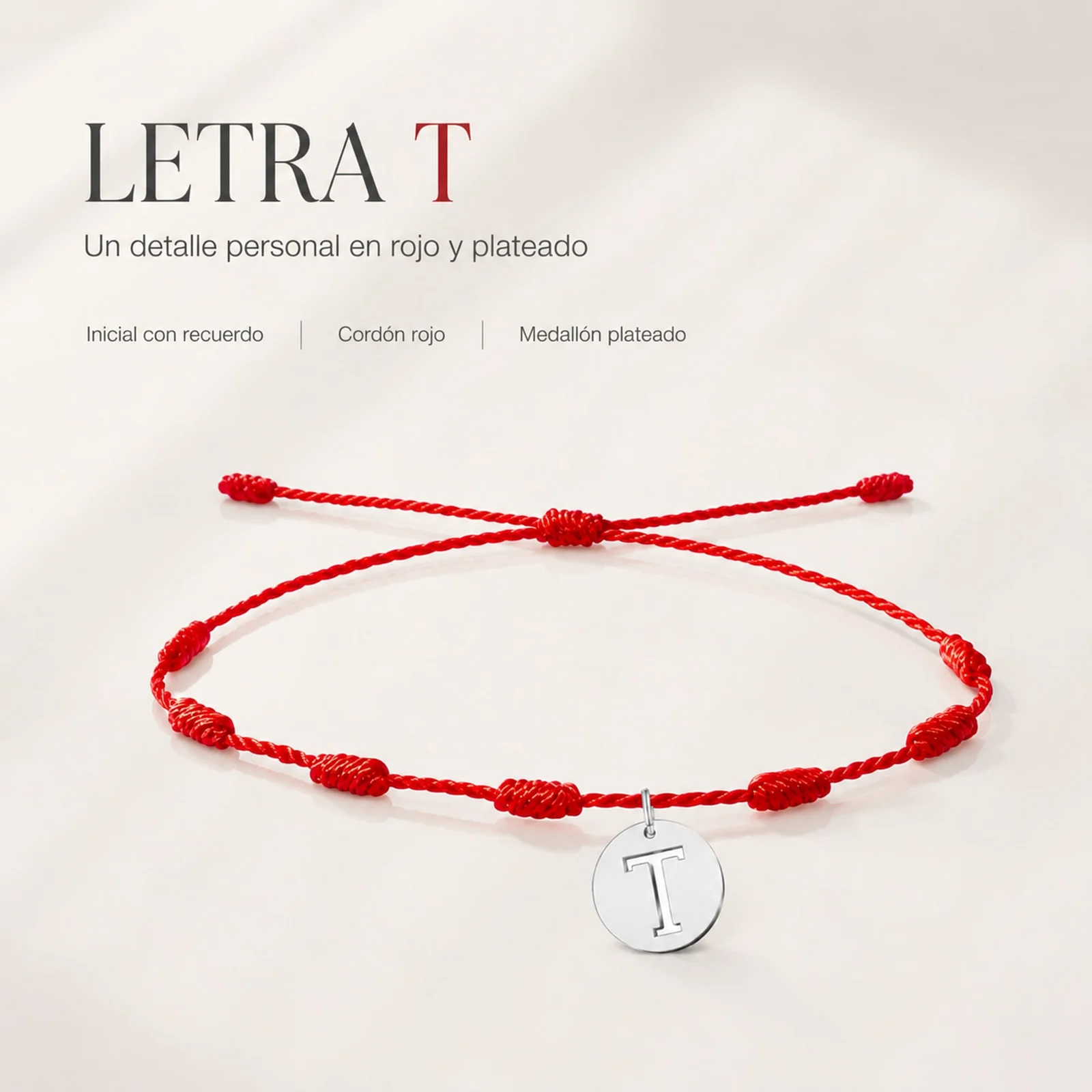 PULSERA 7 NUDOS CON LETRA T COLOR PLATEADO