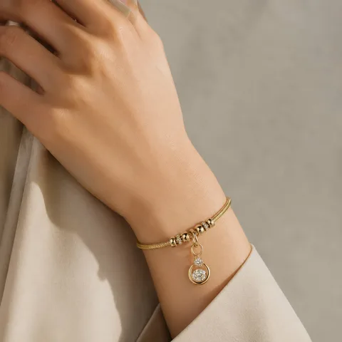 CHARM DE COBRE CHAPADO ORO 14K CON CIRCONITA
