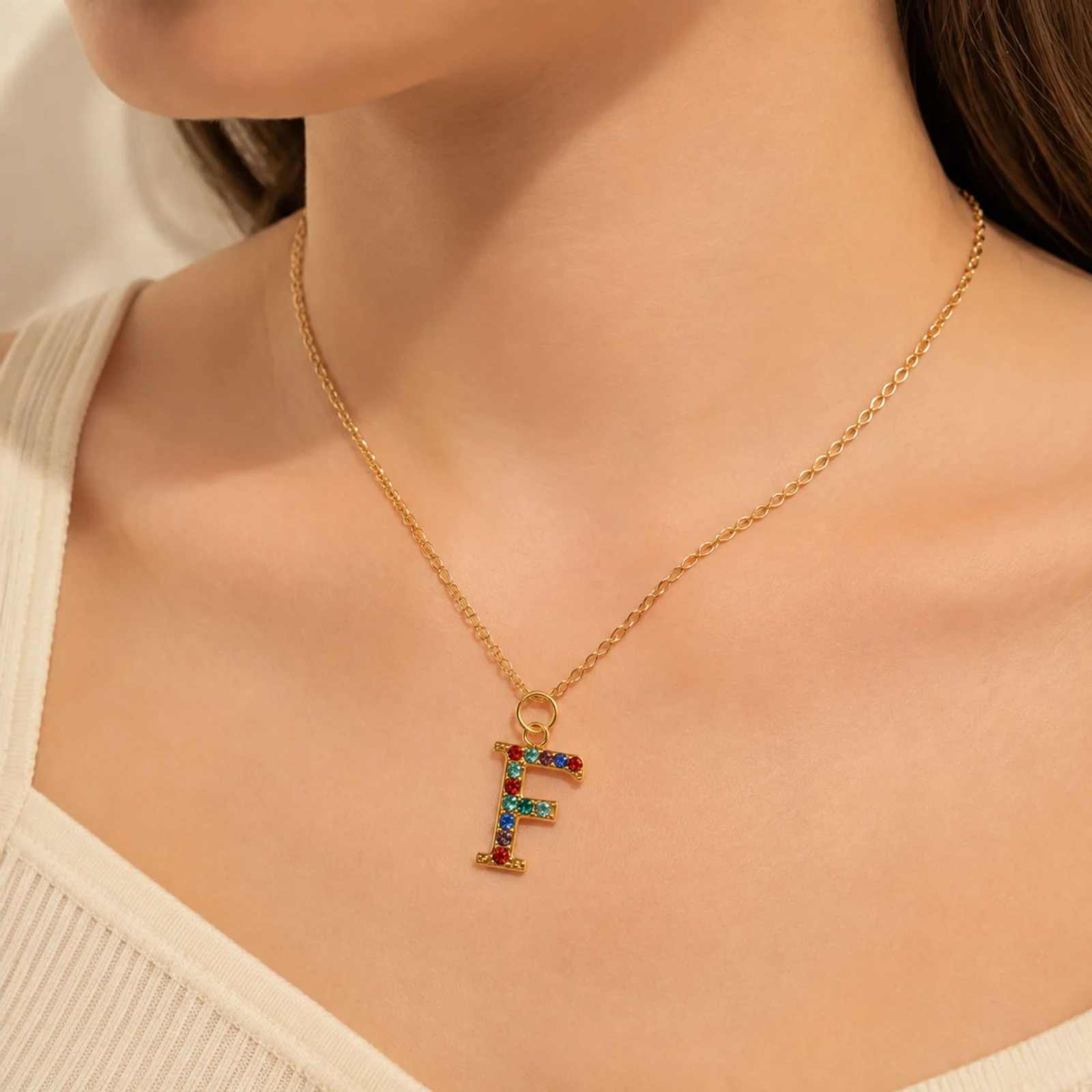 CHARM DE LETRA F ACERO COLOR DORADO CON CIRCONITA