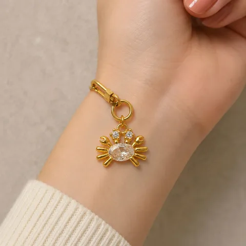 CHARM DE COBRE CHAPADO A ORO 14K CON CIRCONITA-CON CIERRE