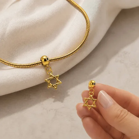 CHARM ACERO DORADO CHAPADO ORO 14 K-CON BOLA DE GOMA