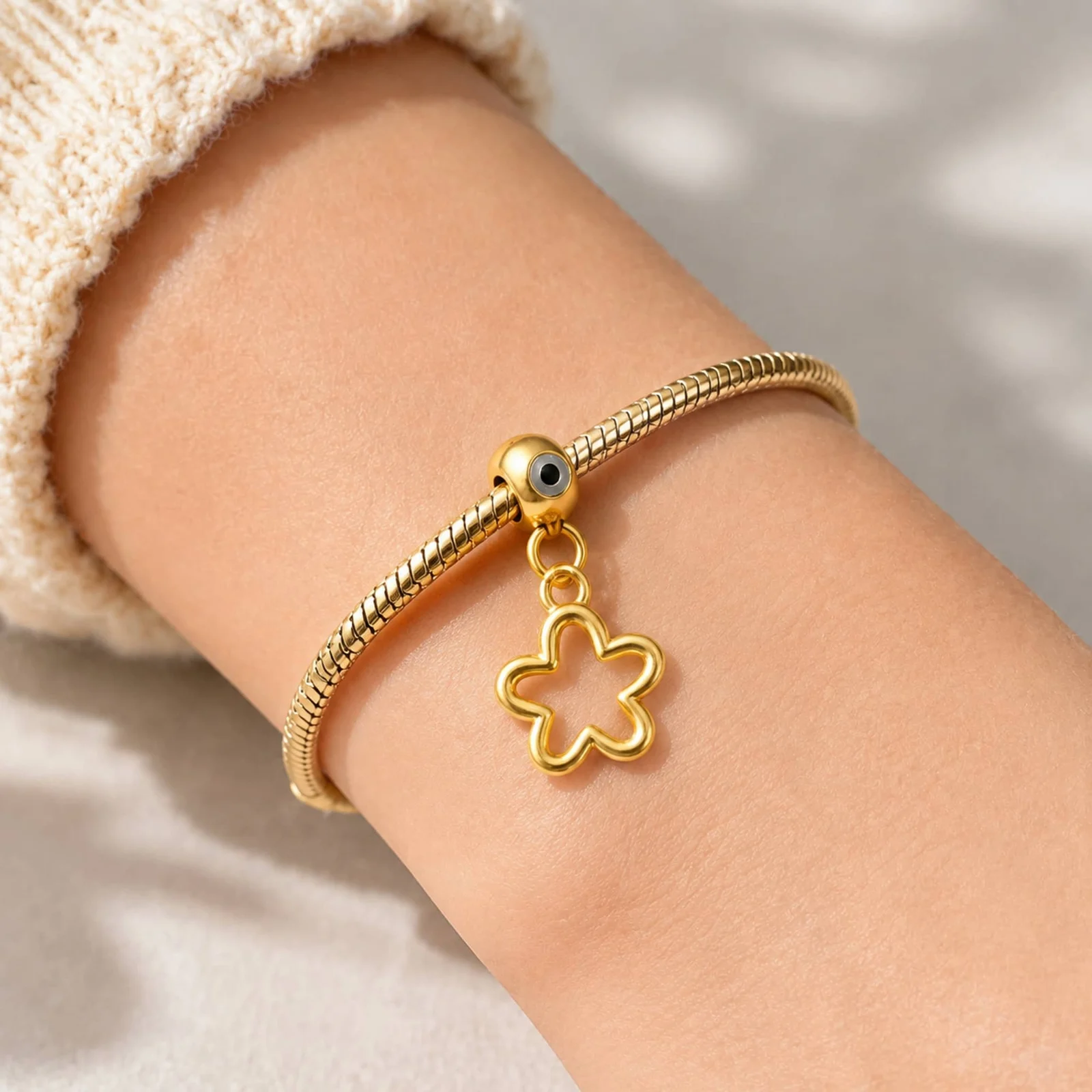 CHARM ACERO DORADO CHAPADO ORO 14 K-CON BOLA DE GOMA