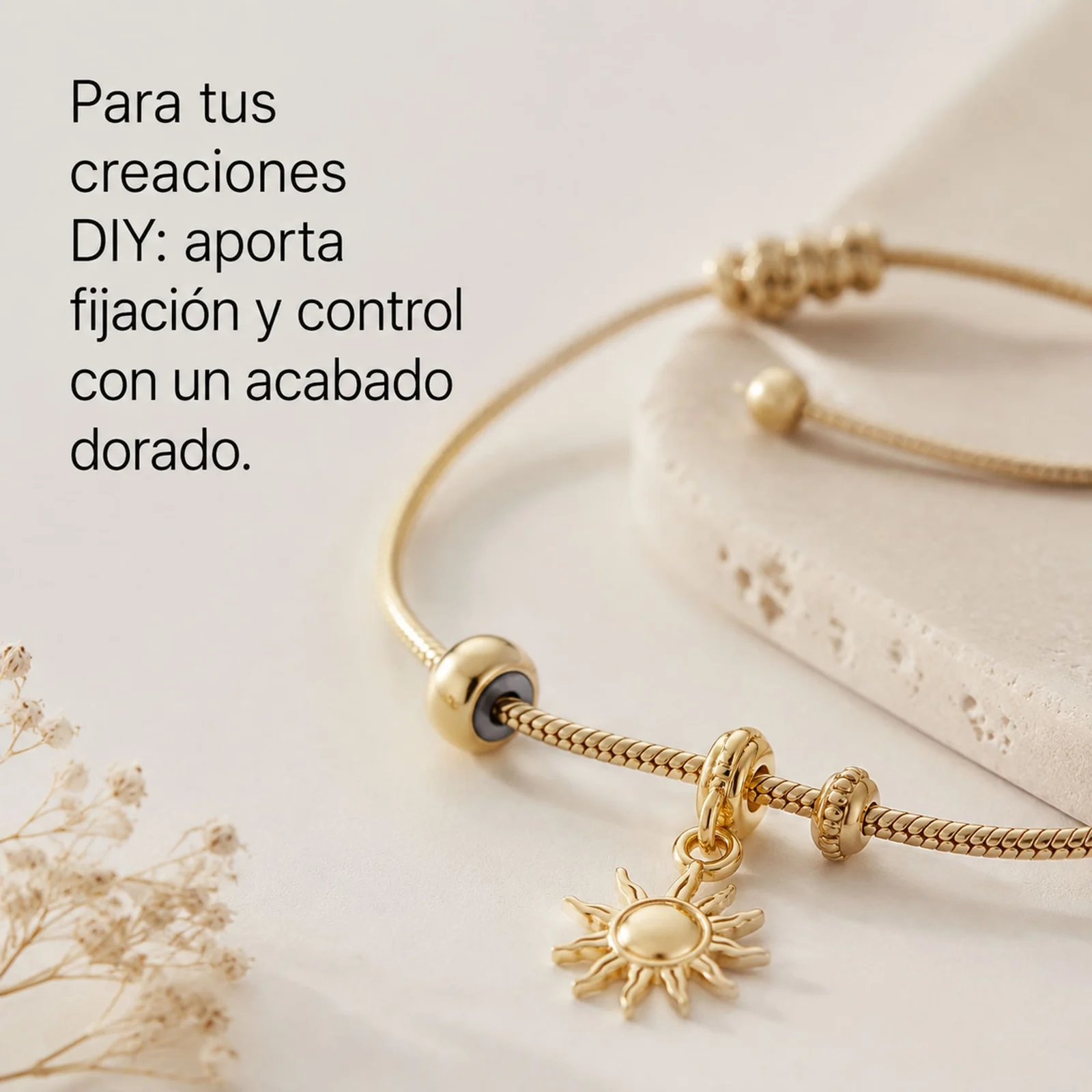 BOLA 4MM ACERO COLOR DORADO CON GOMA PARA FIJAR CHARM