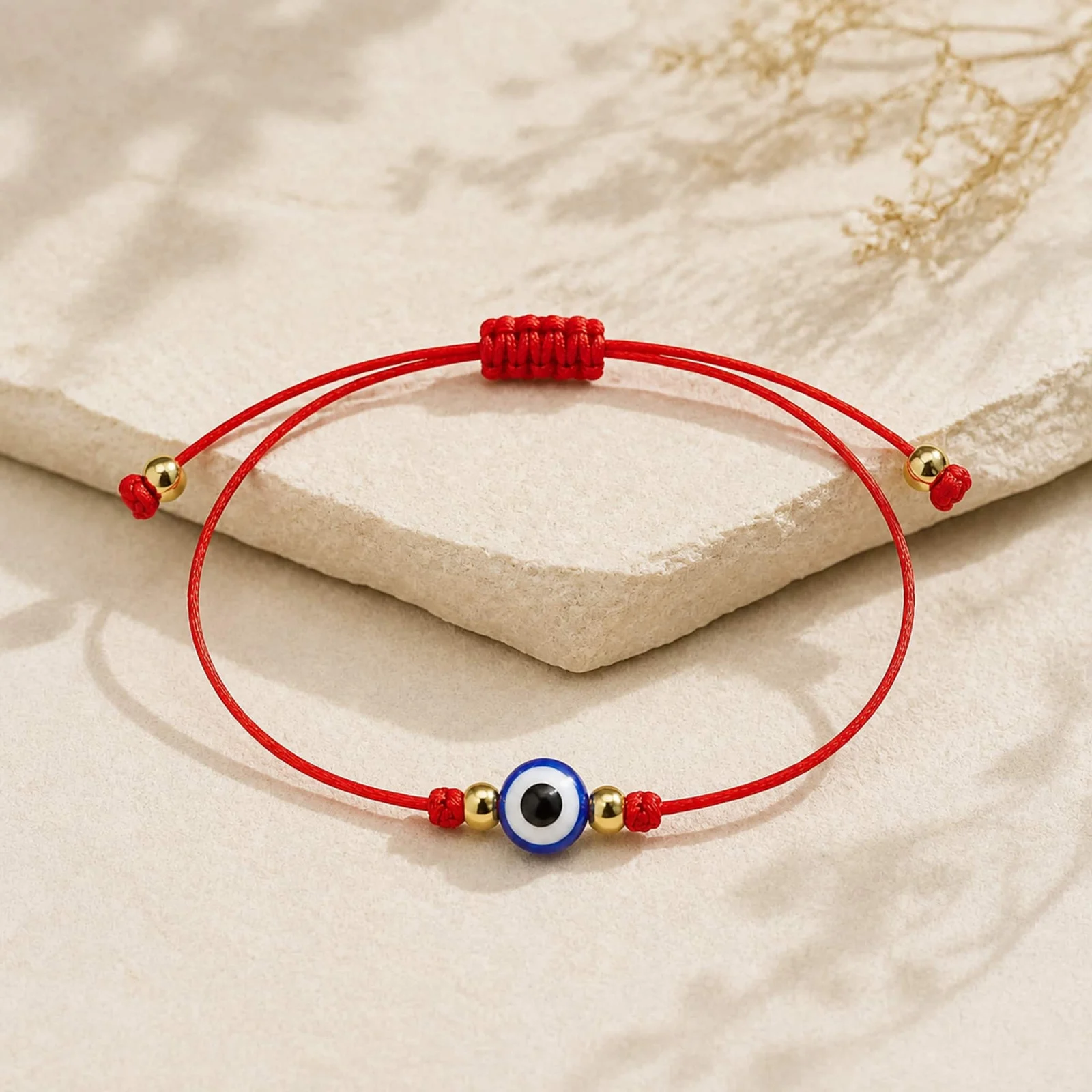 PULSERA HILO ENCERADO ROJO-OJO TURCO
