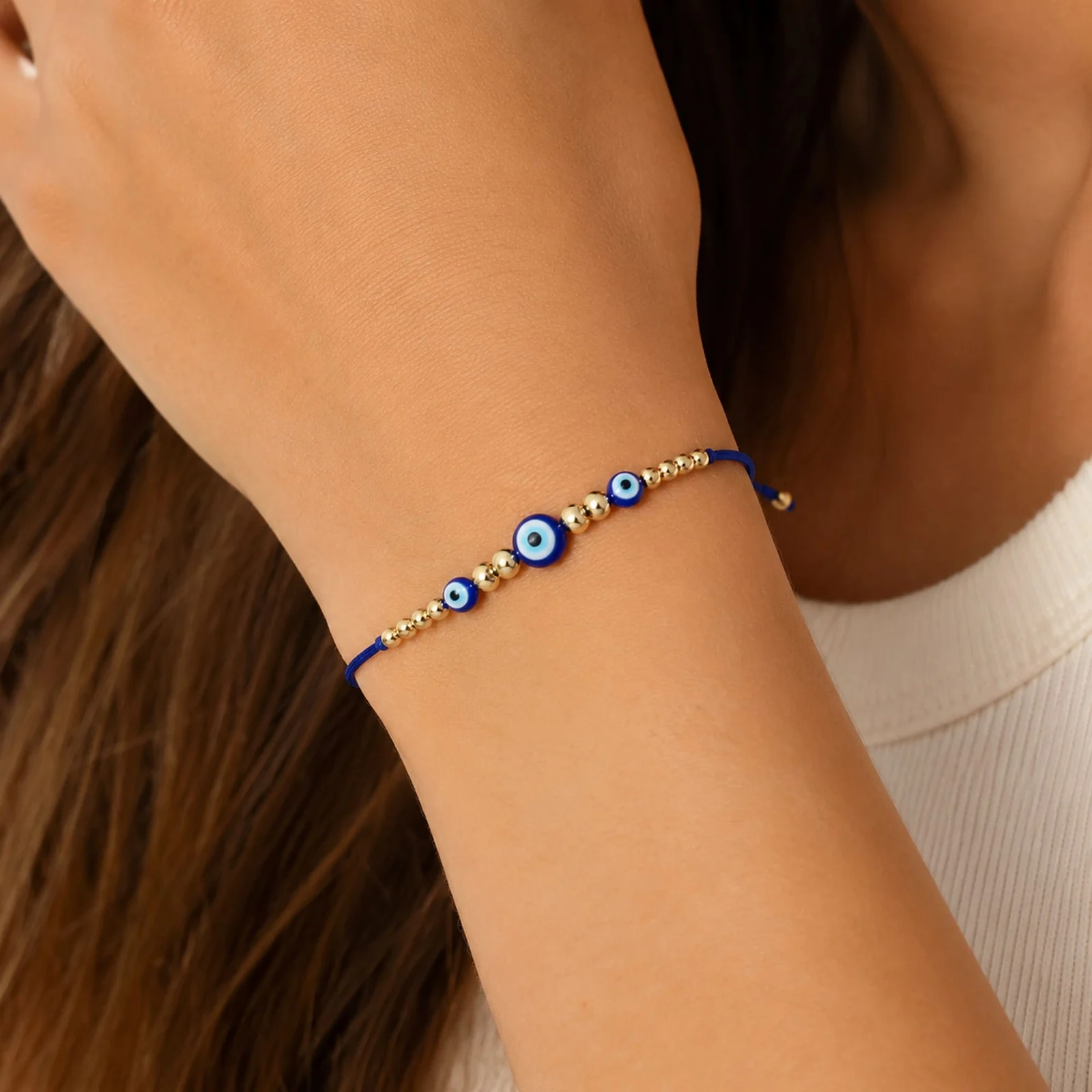 PULSERA OJO TURCO ACERO CON CORDÓN HILO ENCERADO