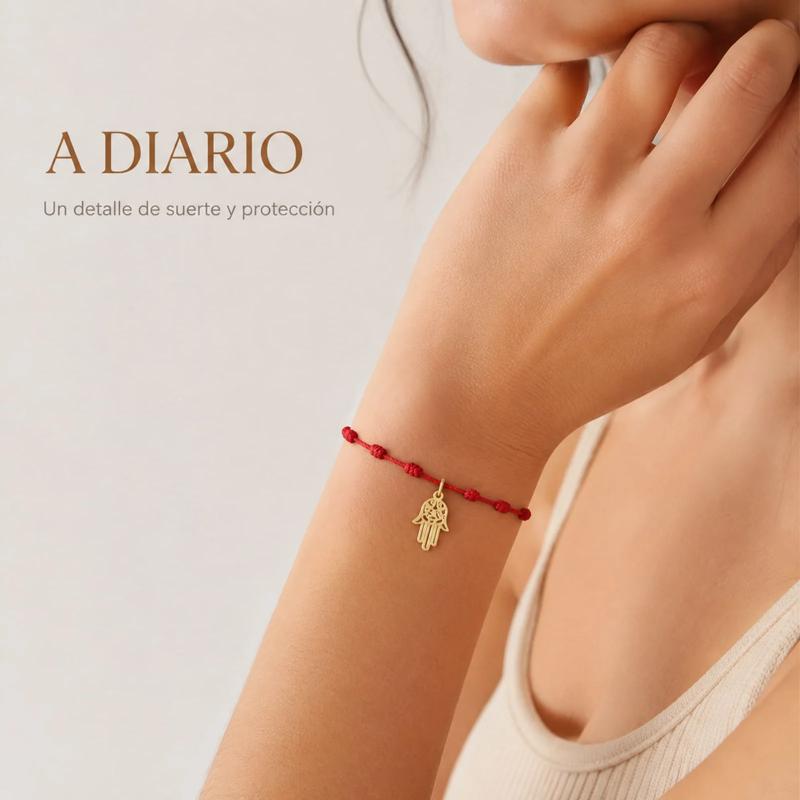 PULSERA 7 NUDOS CON MANO DE FÁTIMA ACERO DORADO