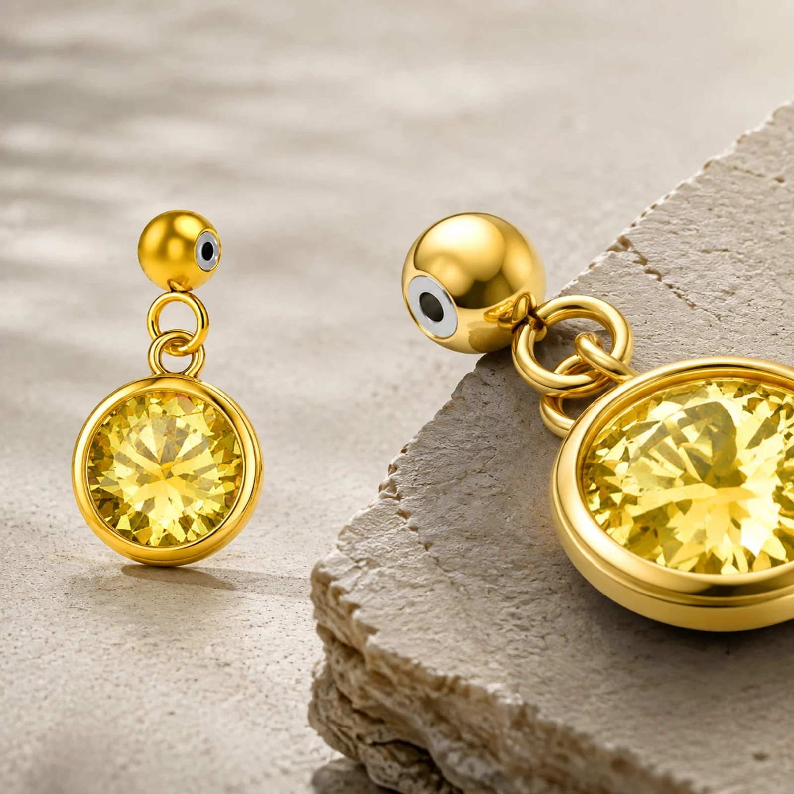 CHARM ACERO DORADO CON PIEDRA NACIMIENTO DE NOVIEMBRE-CON BOLA DE GOMA