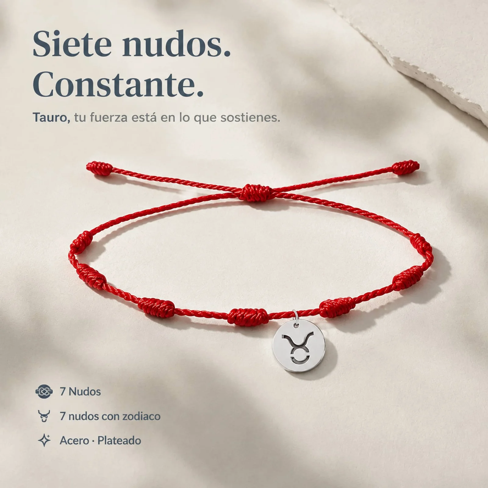 PULSERA 7 NUDOS CON TAURO ACERO. COLOR PLATEADO