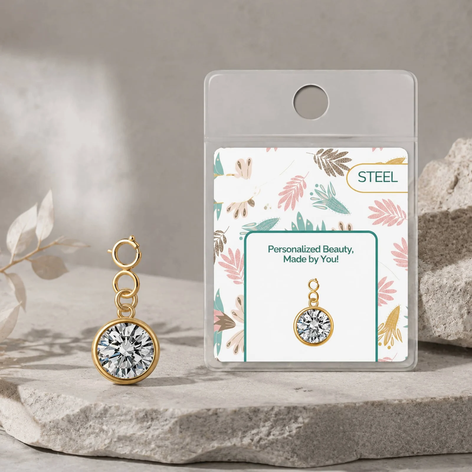 CHARM ACERO DORADO CON PIEDRA NACIMIENTO DE ABRIL-CON CIERRE